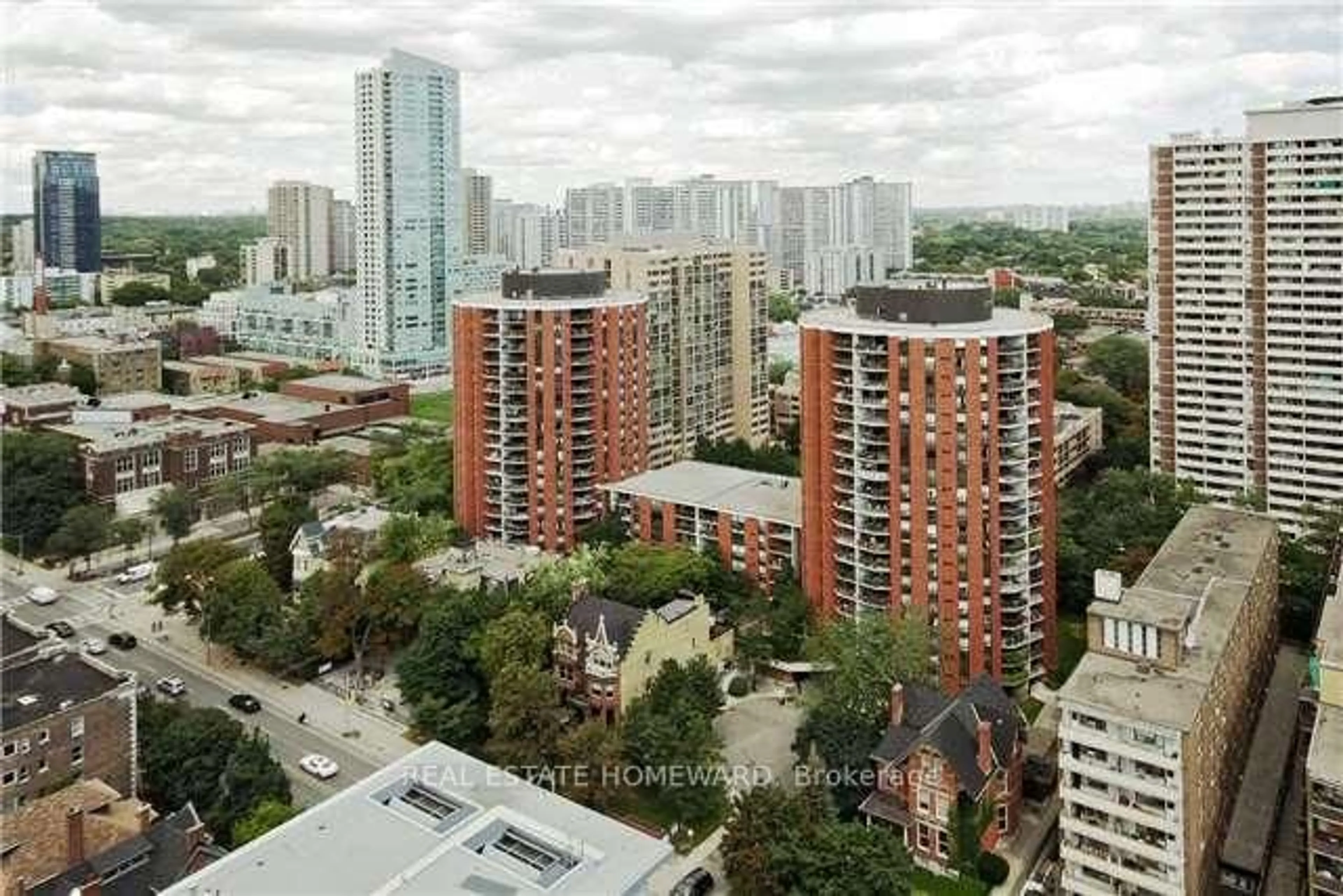 A pic from outside/outdoor area/front of a property/back of a property/a pic from drone, city buildings view from balcony for 77 Maitland Pl #1219, Toronto Ontario M4Y 2V6