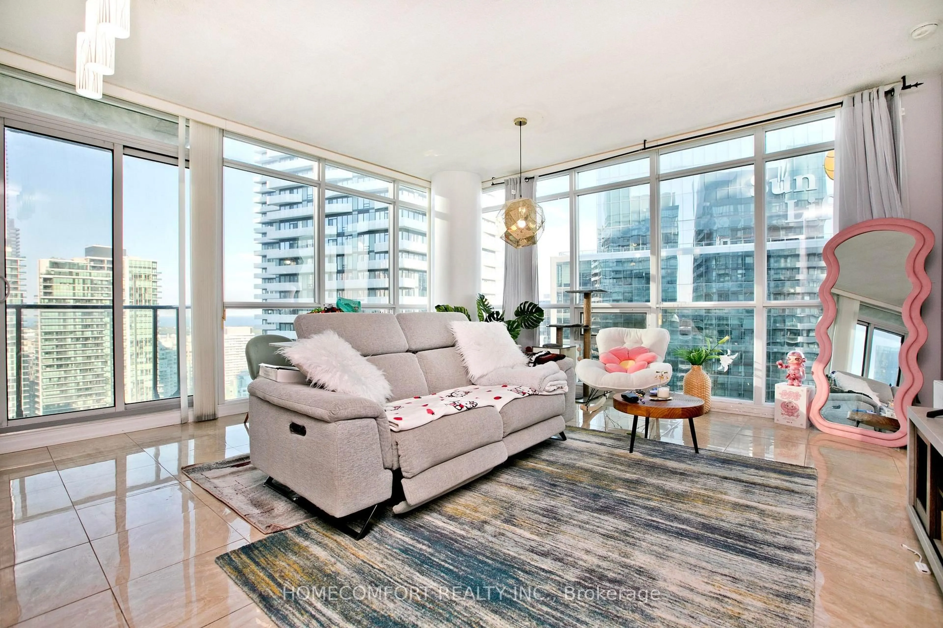 Living room with furniture, unknown for 55 Bremner Blvd #4107, Toronto Ontario M5J 0A6