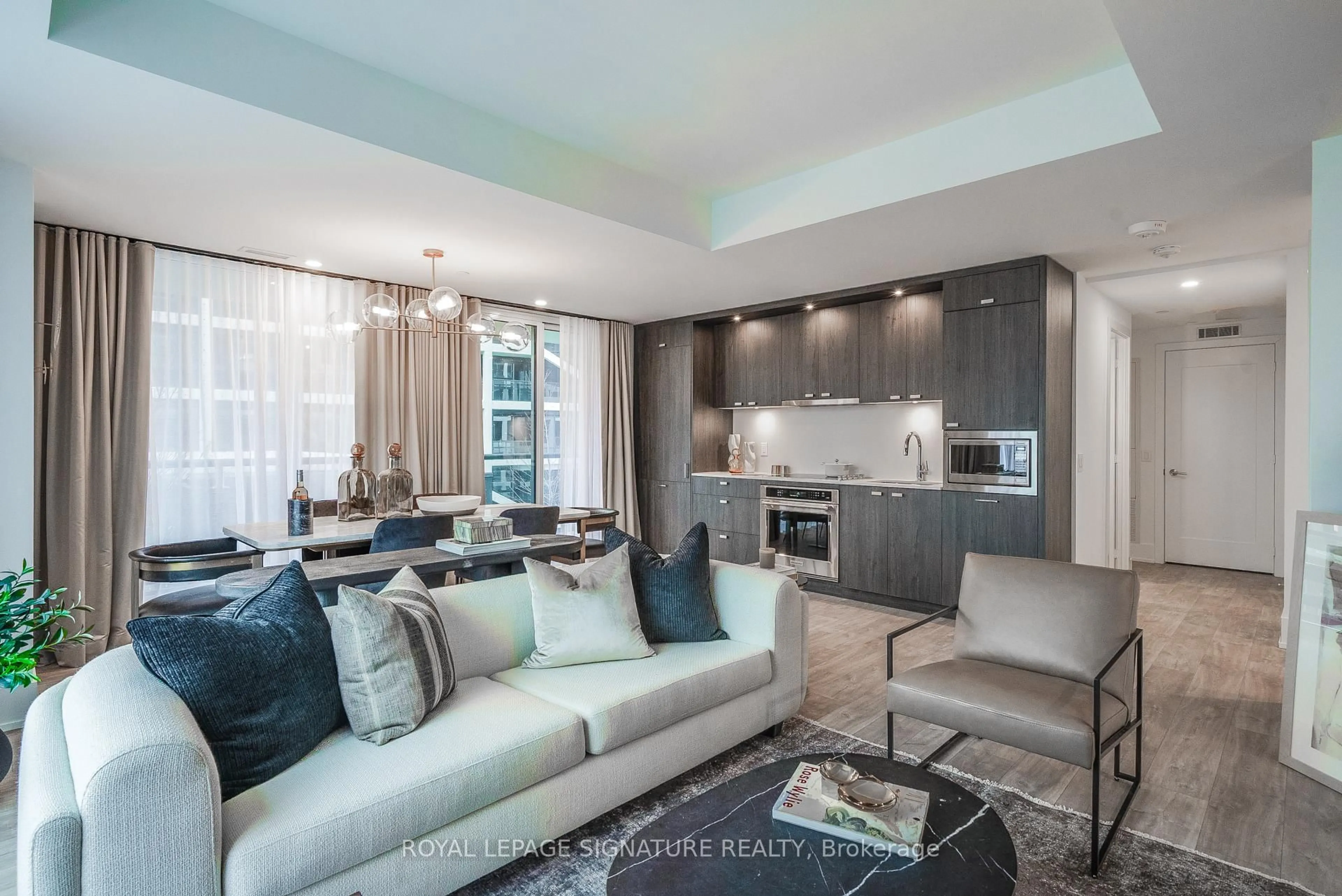 Living room with furniture, unknown for 115 Denison Ave #613, Toronto Ontario M5T 2N1