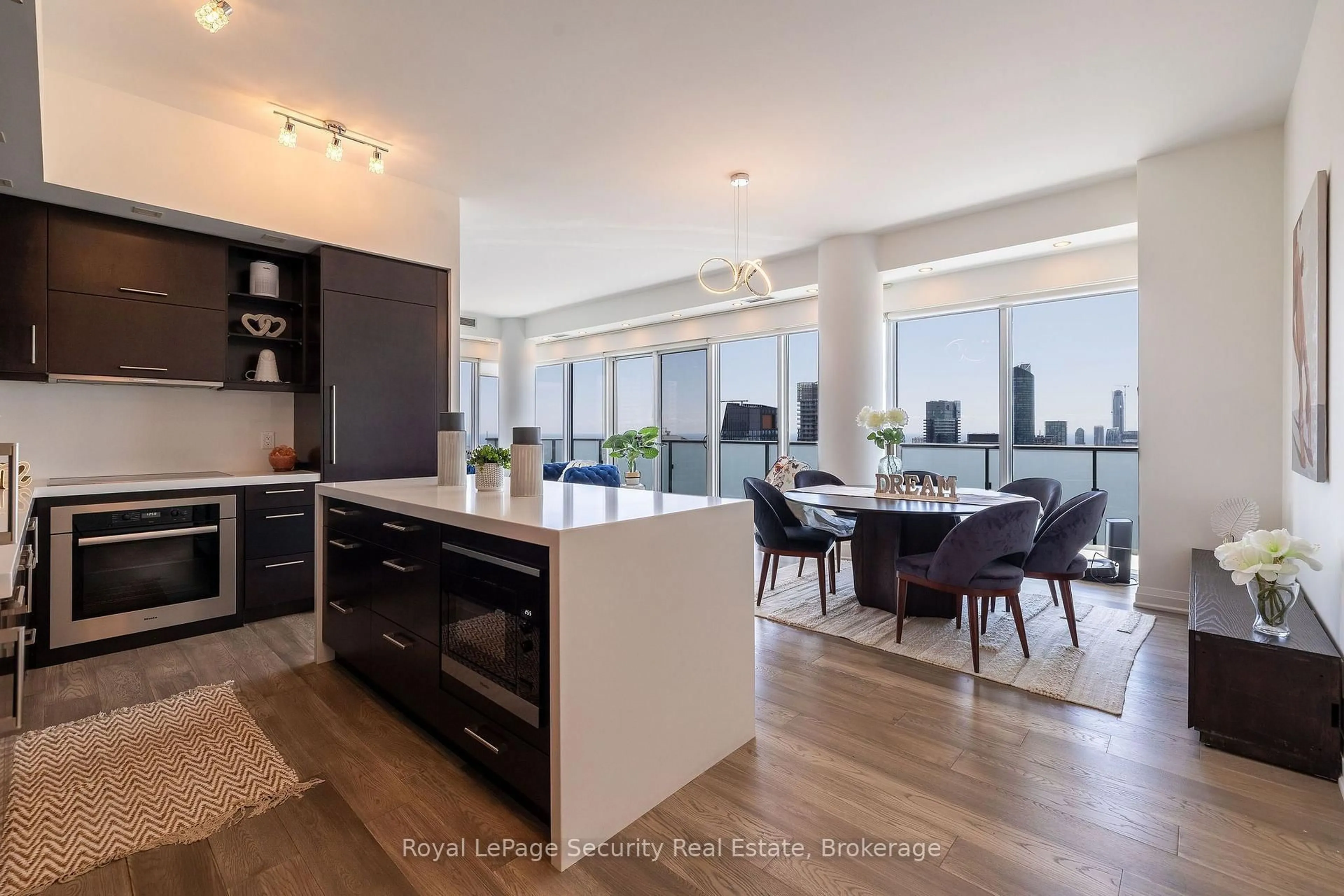 Open concept kitchen, wood/laminate floor for 1080 Bay St #5301, Toronto Ontario M5S 0A6