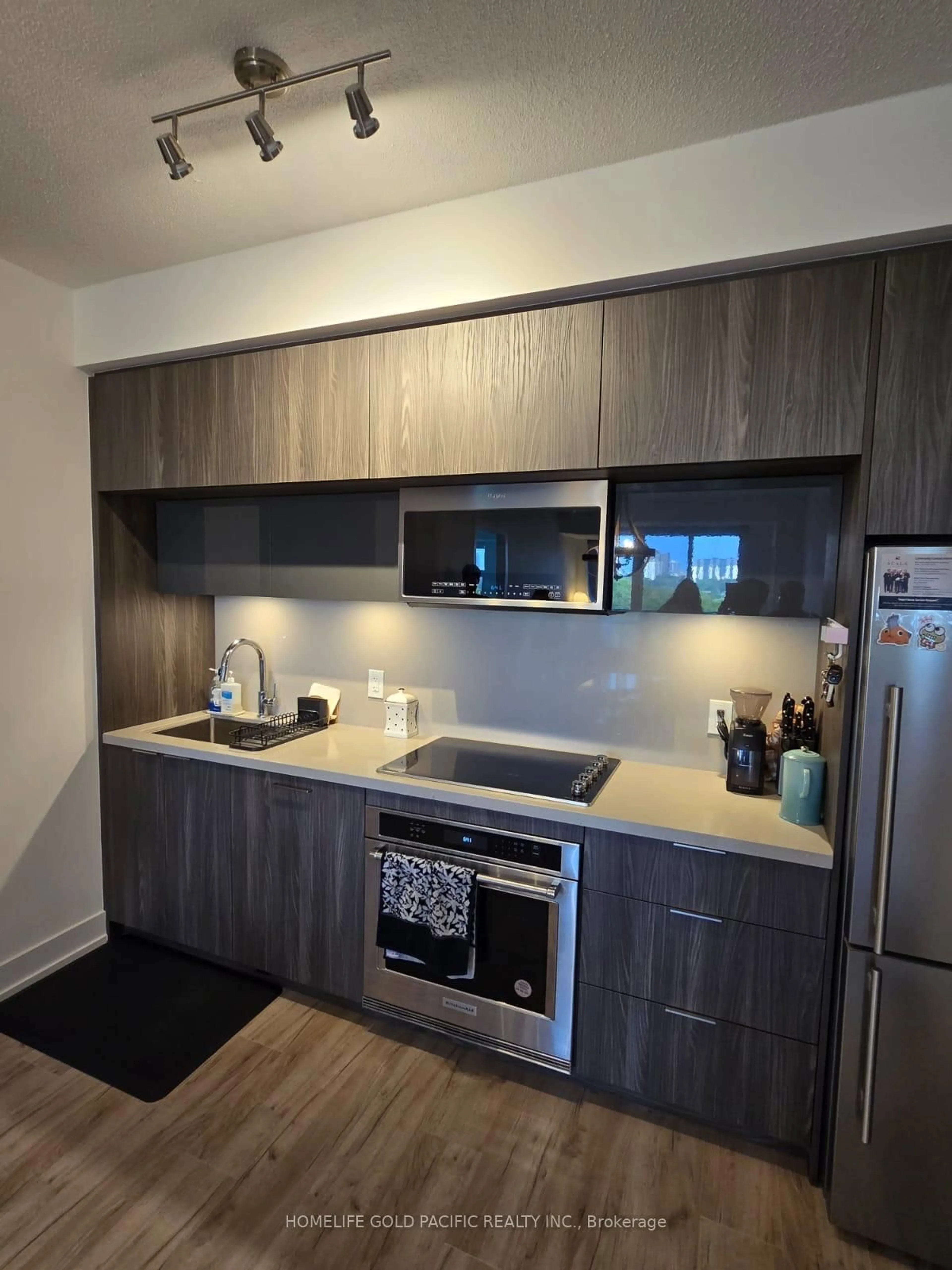 Standard kitchen, wood/laminate floor for 25 Adra Grado Way #1136, Toronto Ontario M2J 0H6