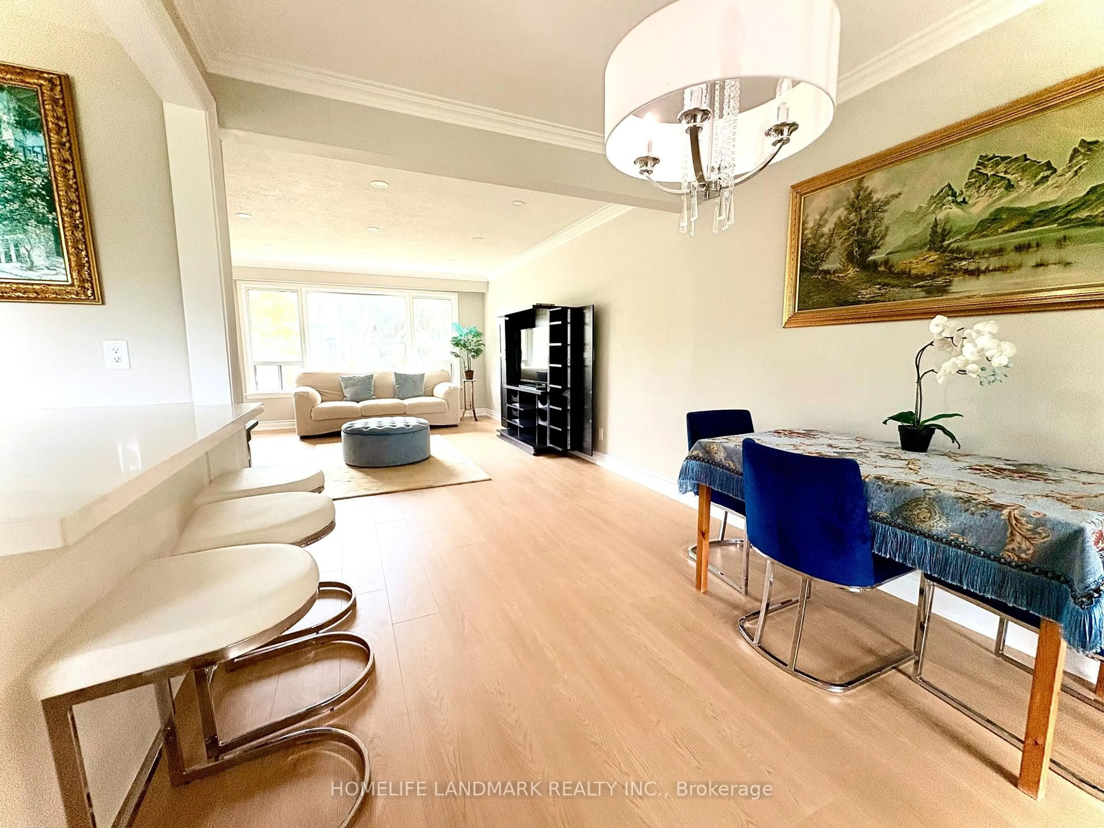 Living room with furniture, wood/laminate floor for 46 Bowerbank Dr, Toronto Ontario M2M 1Z8