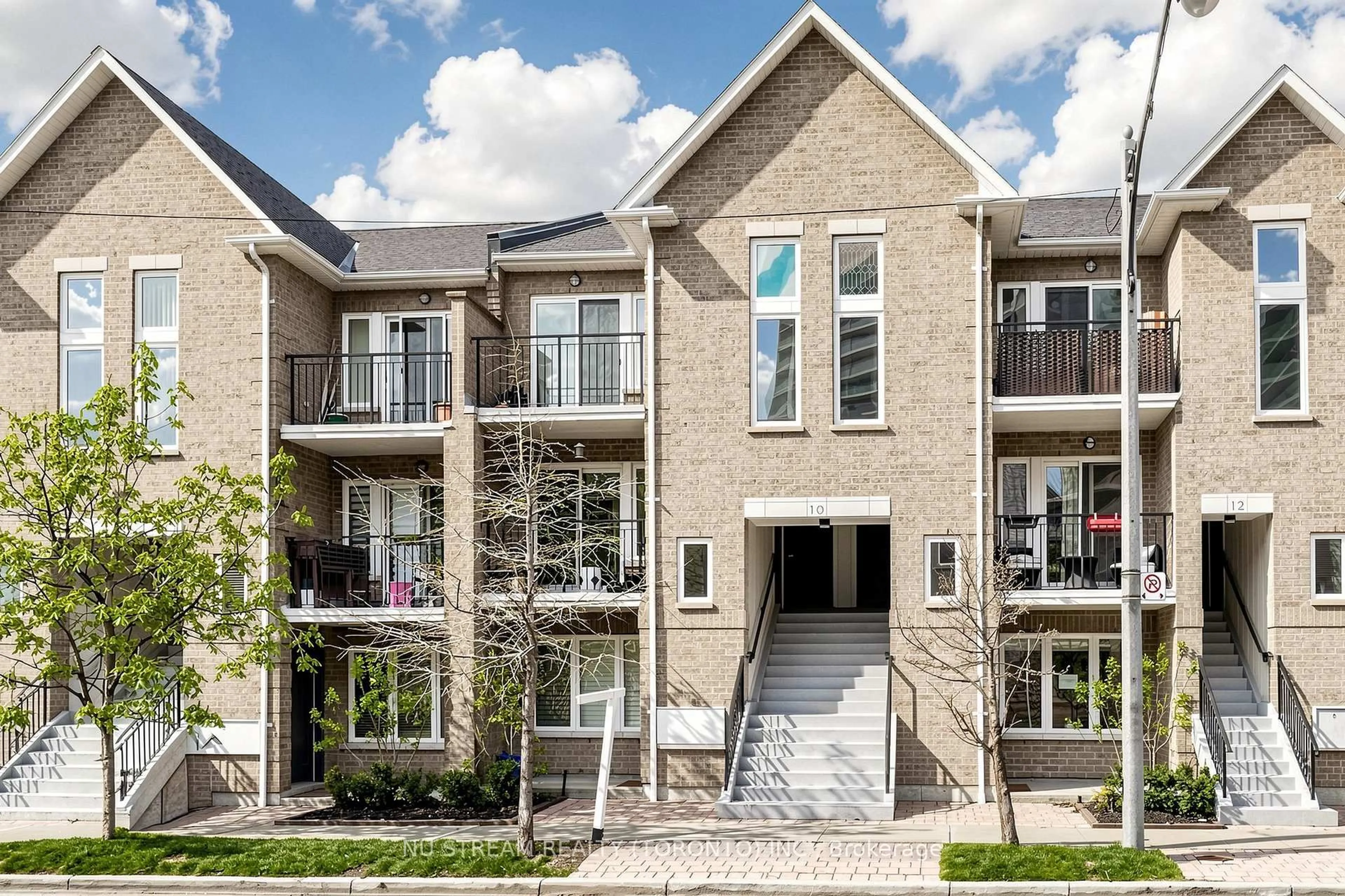 Home with brick exterior material, street for 10 Brian Peck Cres #201, Toronto Ontario M4G 4K4