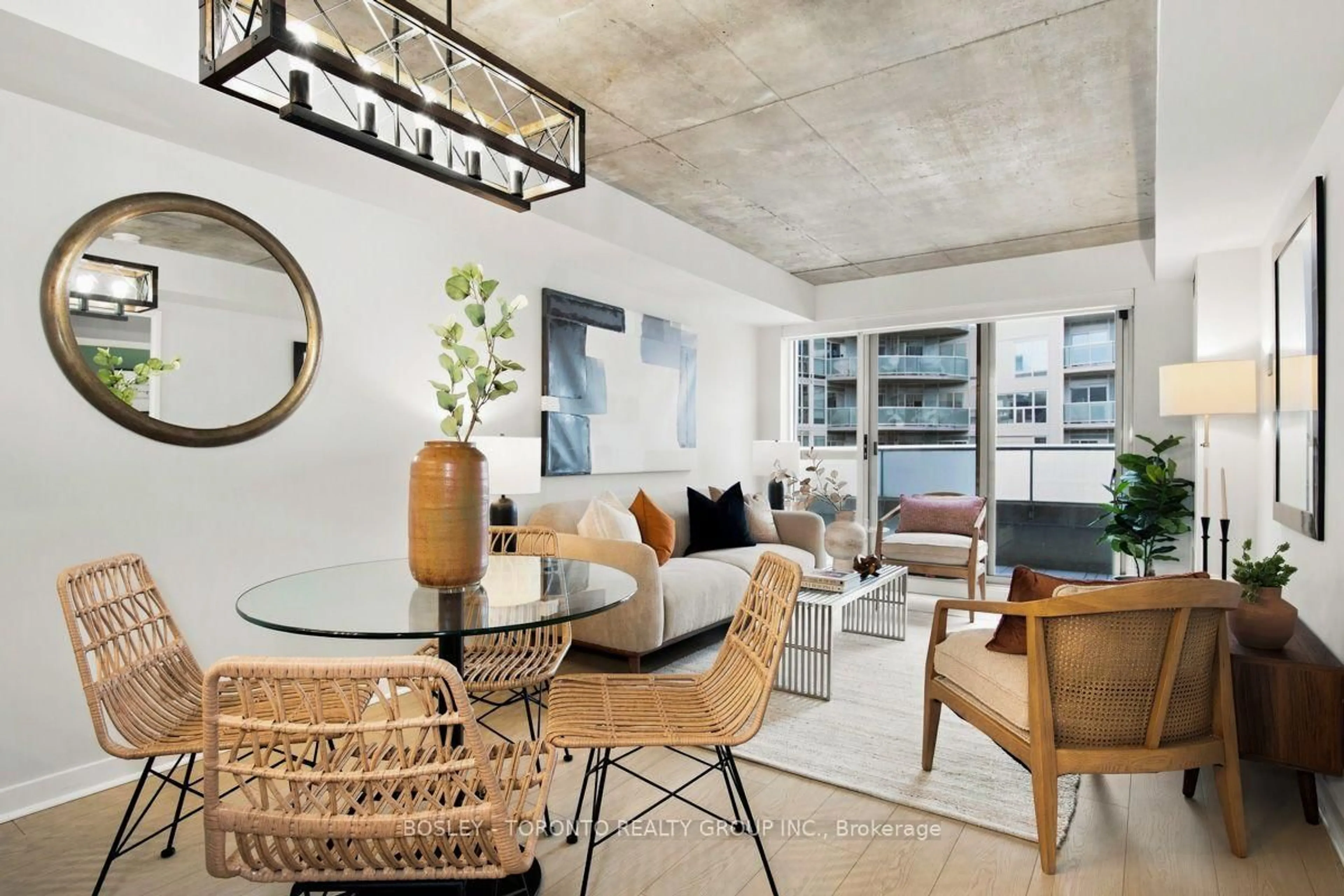 Living room with furniture, cement floor for 1005 King St #338, Toronto Ontario M6K 3M8