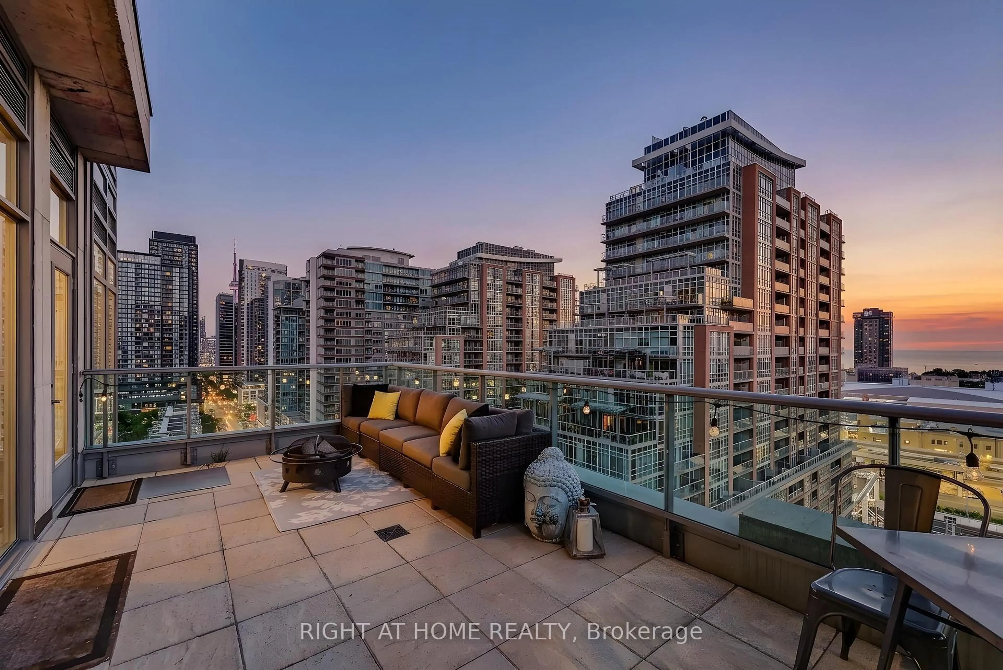 Patio, city buildings view from balcony for 69 Lynn Williams St #PH03, Toronto Ontario M6K 3R7