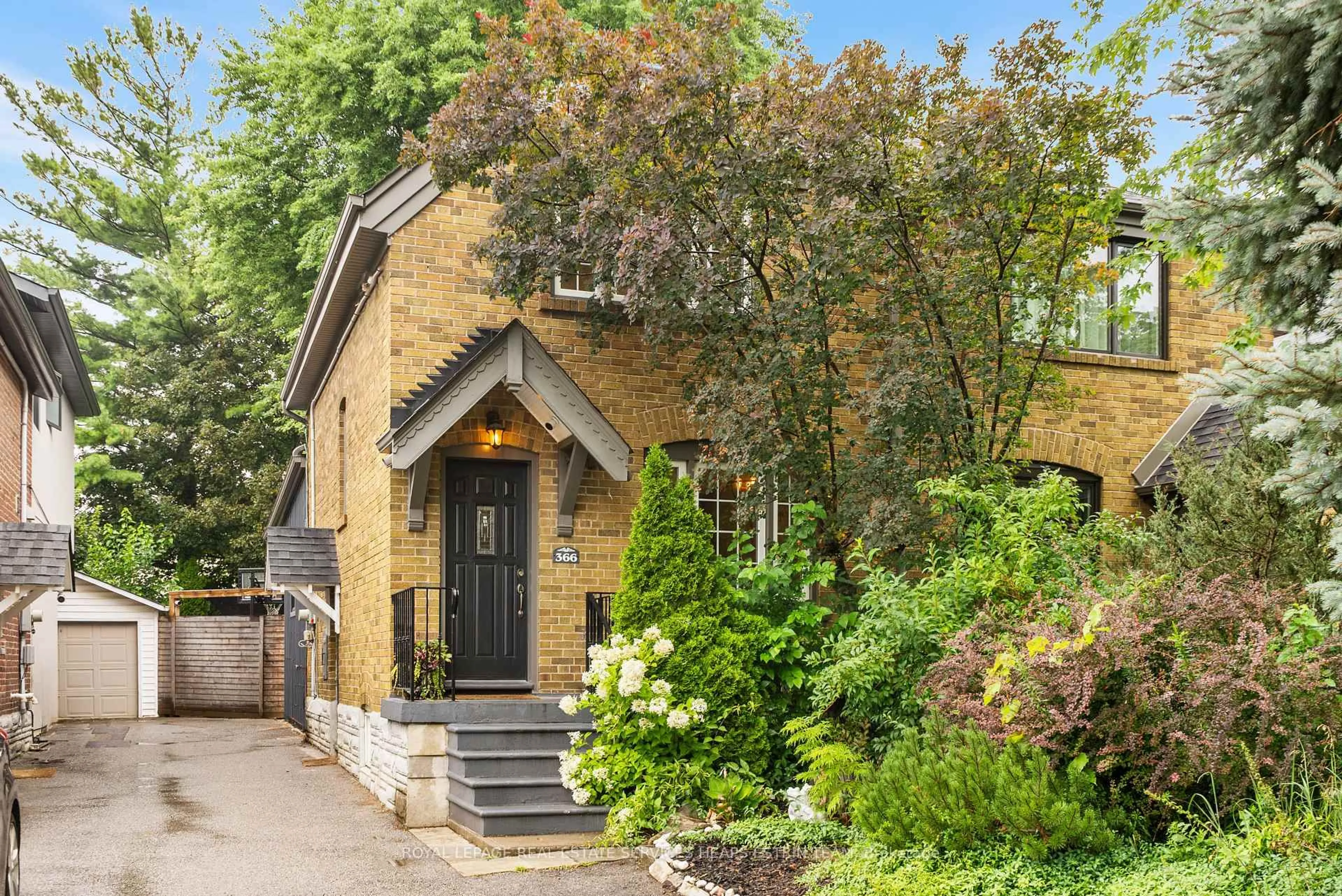 Home with brick exterior material, street for 366 Laird Dr, Toronto Ontario M4G 3X9