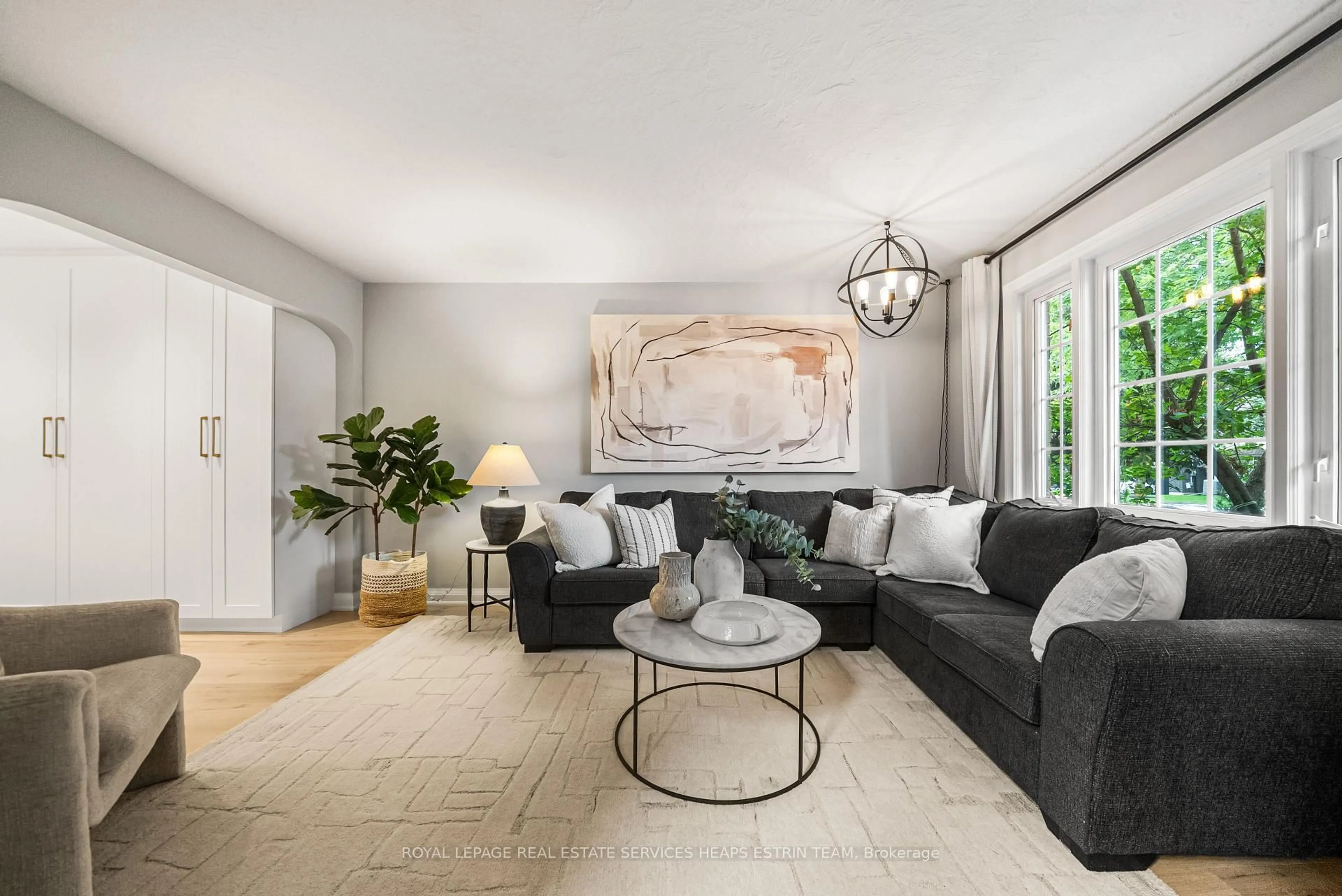 Living room with furniture, unknown for 366 Laird Dr, Toronto Ontario M4G 3X9