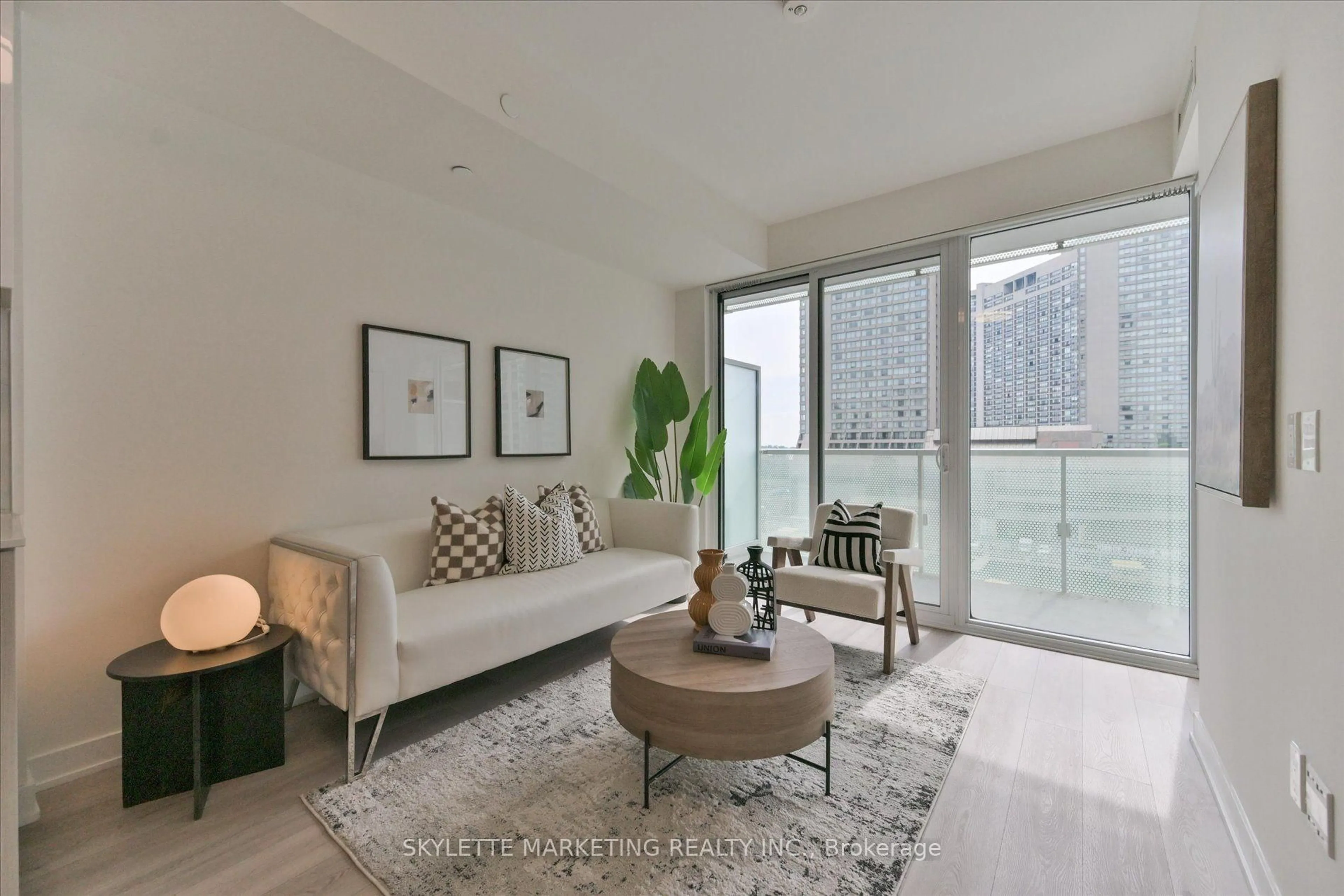 Living room with furniture, unknown for 15 Queens Quay #617, Toronto Ontario M5E 0C5