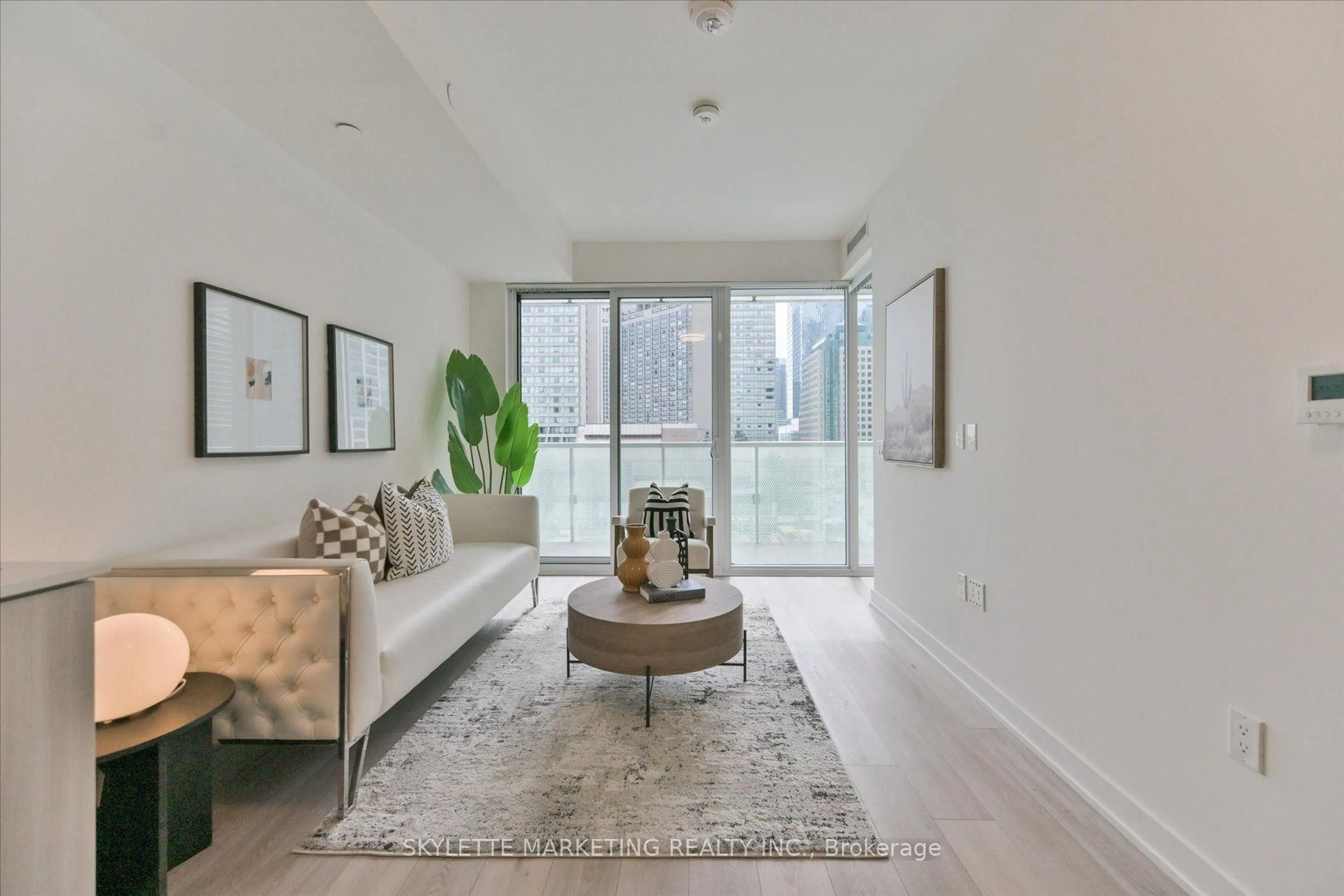Living room with furniture, unknown for 15 Queens Quay #617, Toronto Ontario M5E 0C5