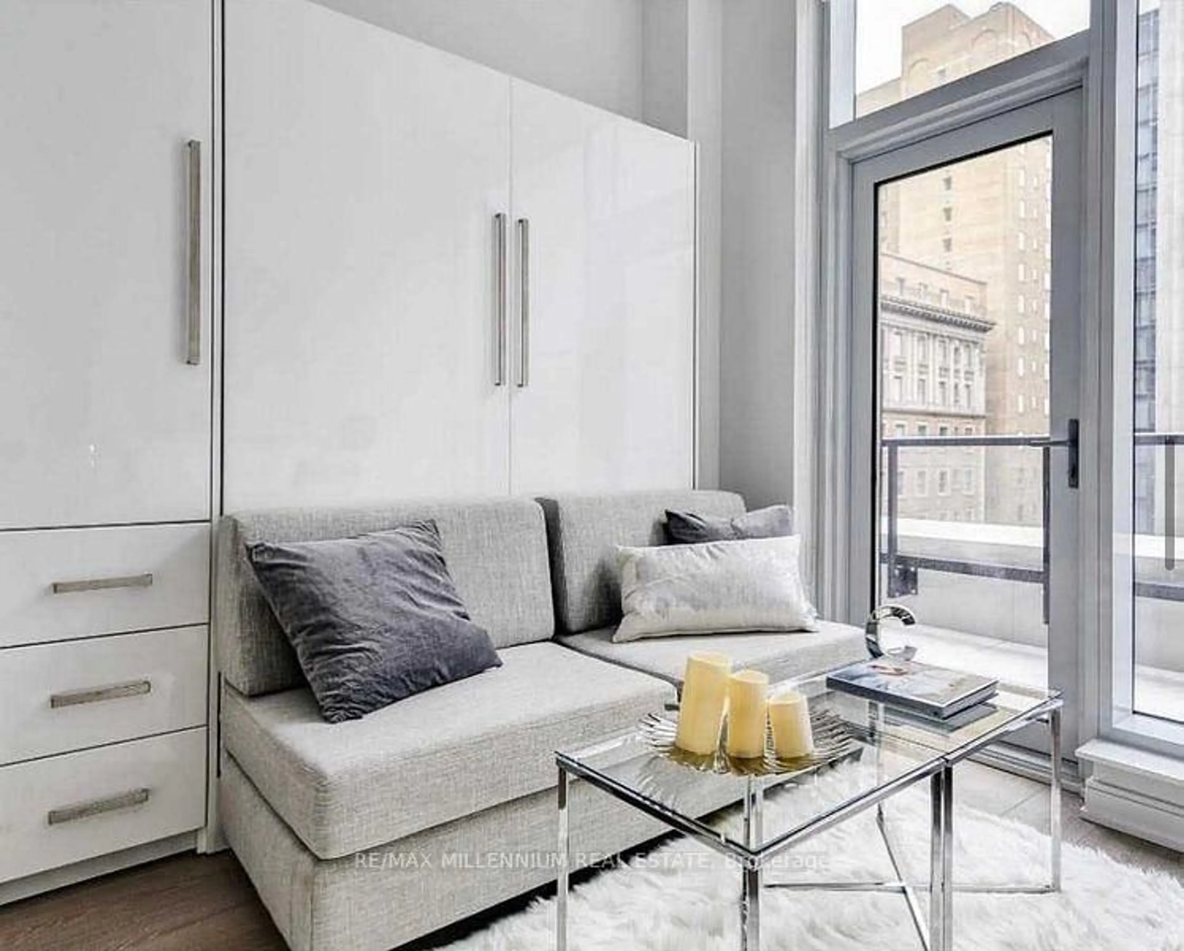 Living room with furniture, unknown for 88 Scott St #604, Toronto Ontario M5E 1X6