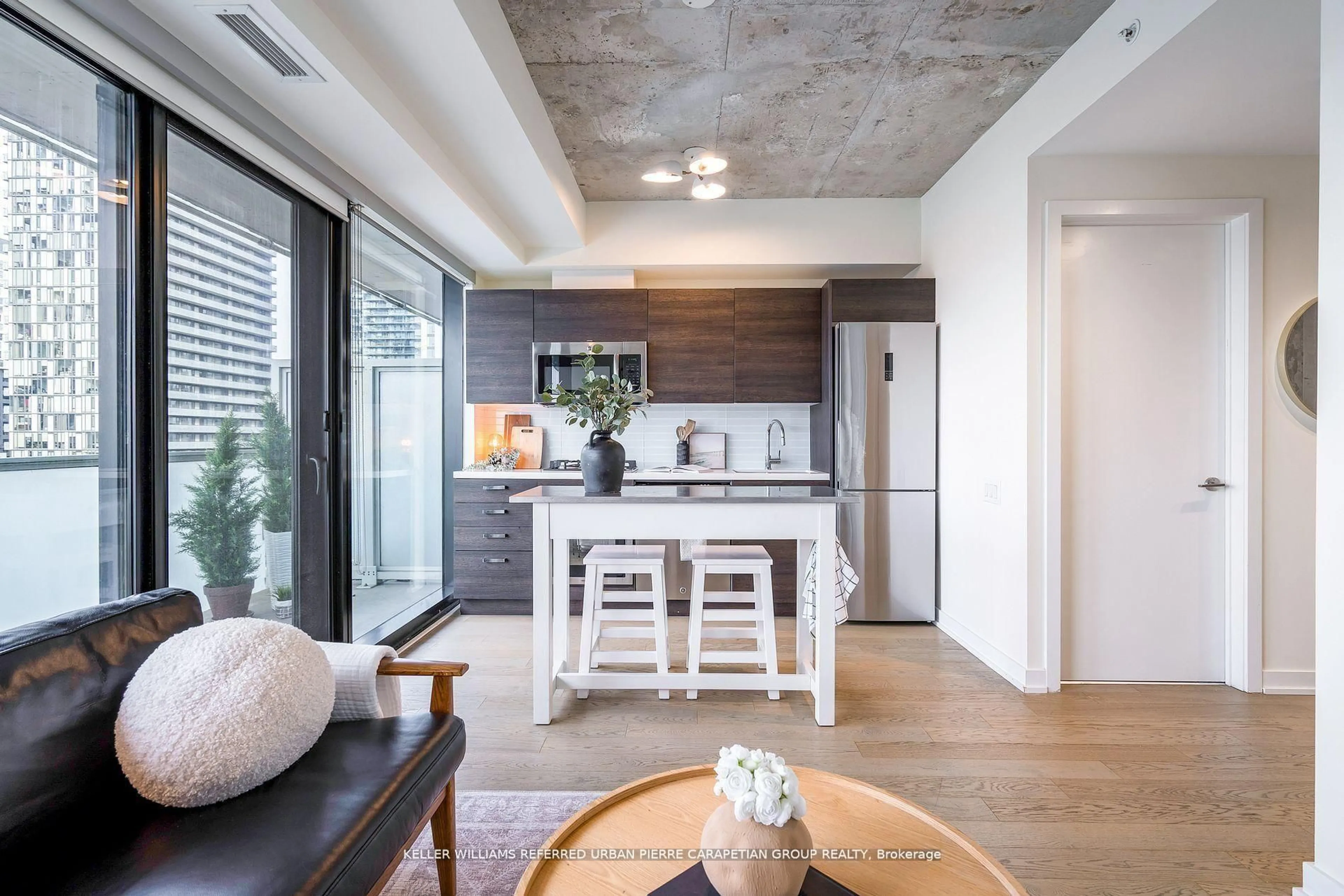 Open concept kitchen, cement floor for 11 Charlotte St #2004, Toronto Ontario M5V 0M6