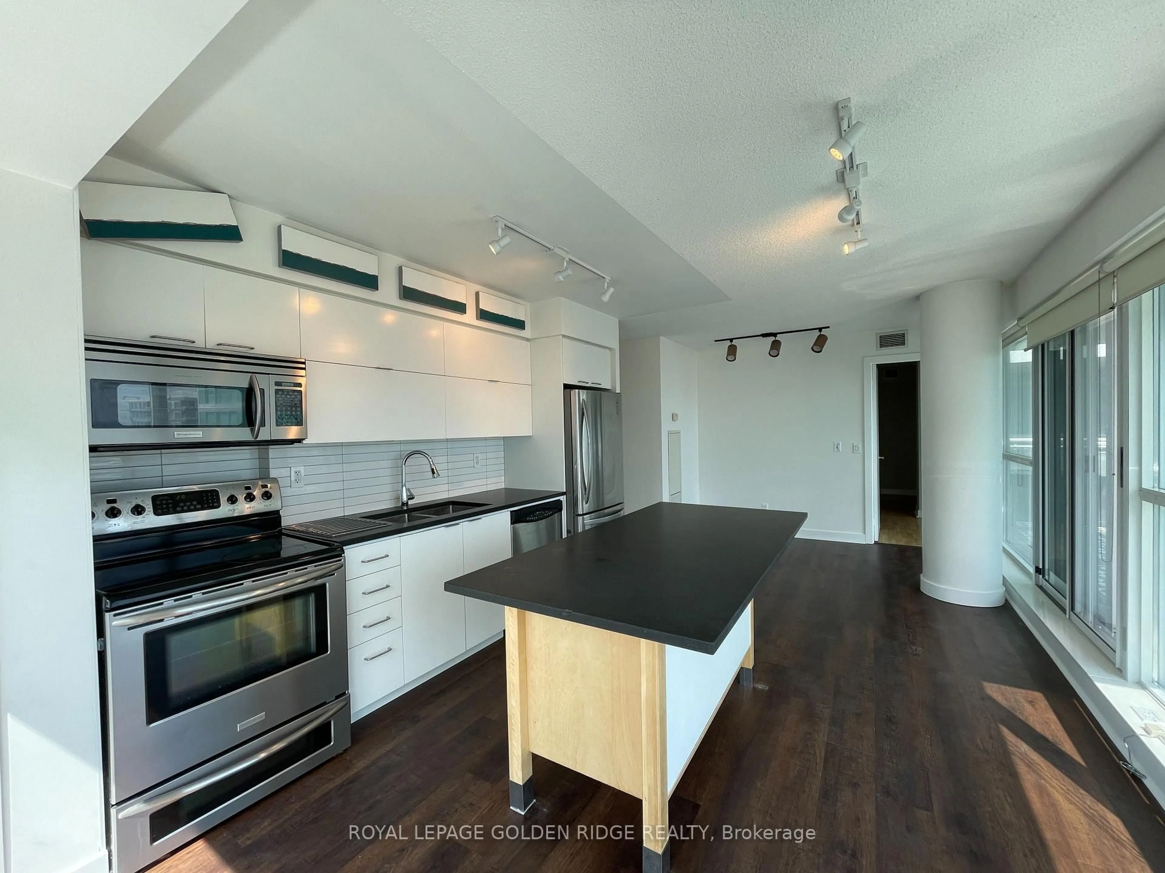 Open concept kitchen, wood/laminate floor for 80 Western Battery Rd #2303, Toronto Ontario M6K 3S1