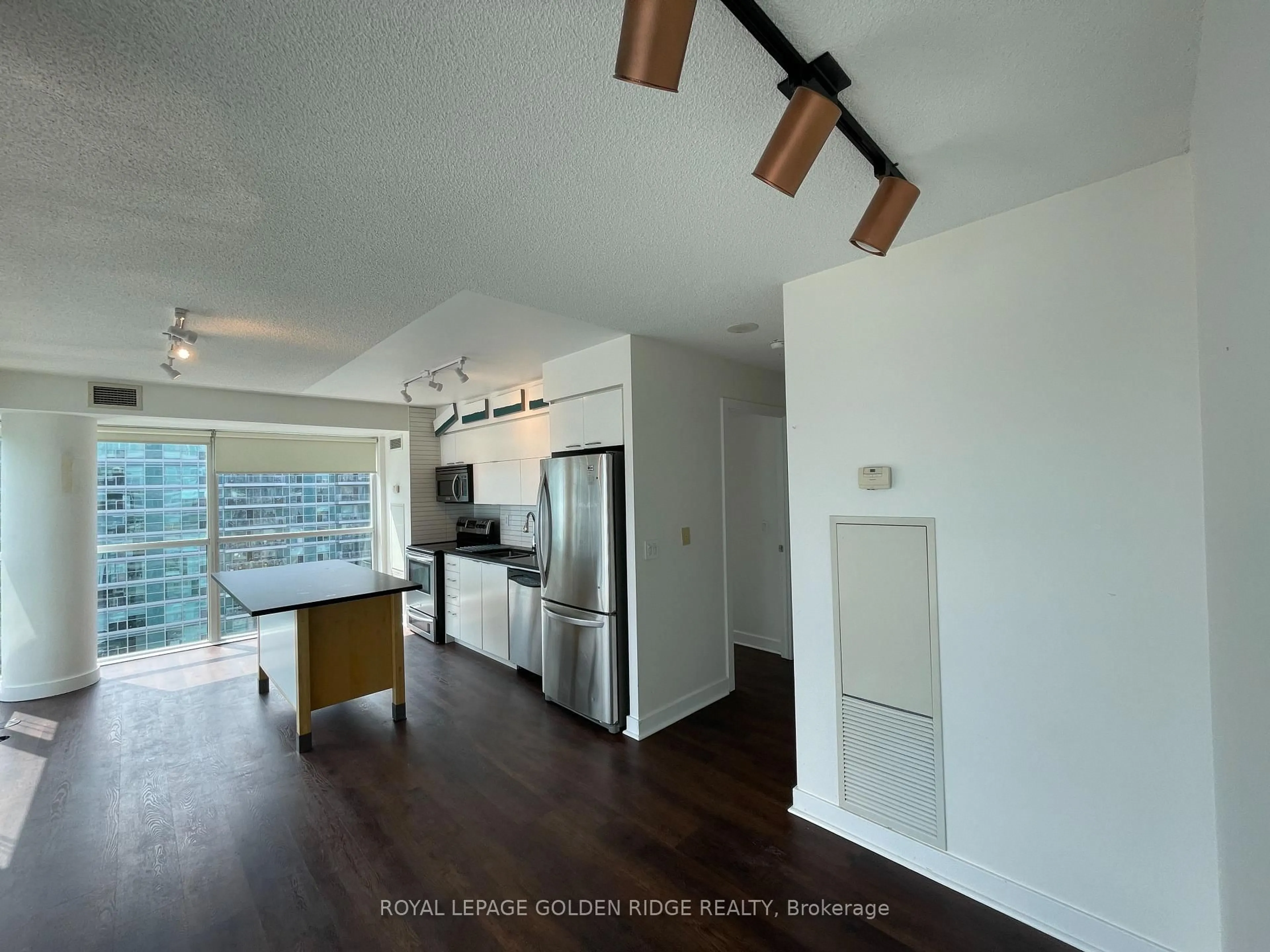 Open concept kitchen, wood/laminate floor for 80 Western Battery Rd #2303, Toronto Ontario M6K 3S1