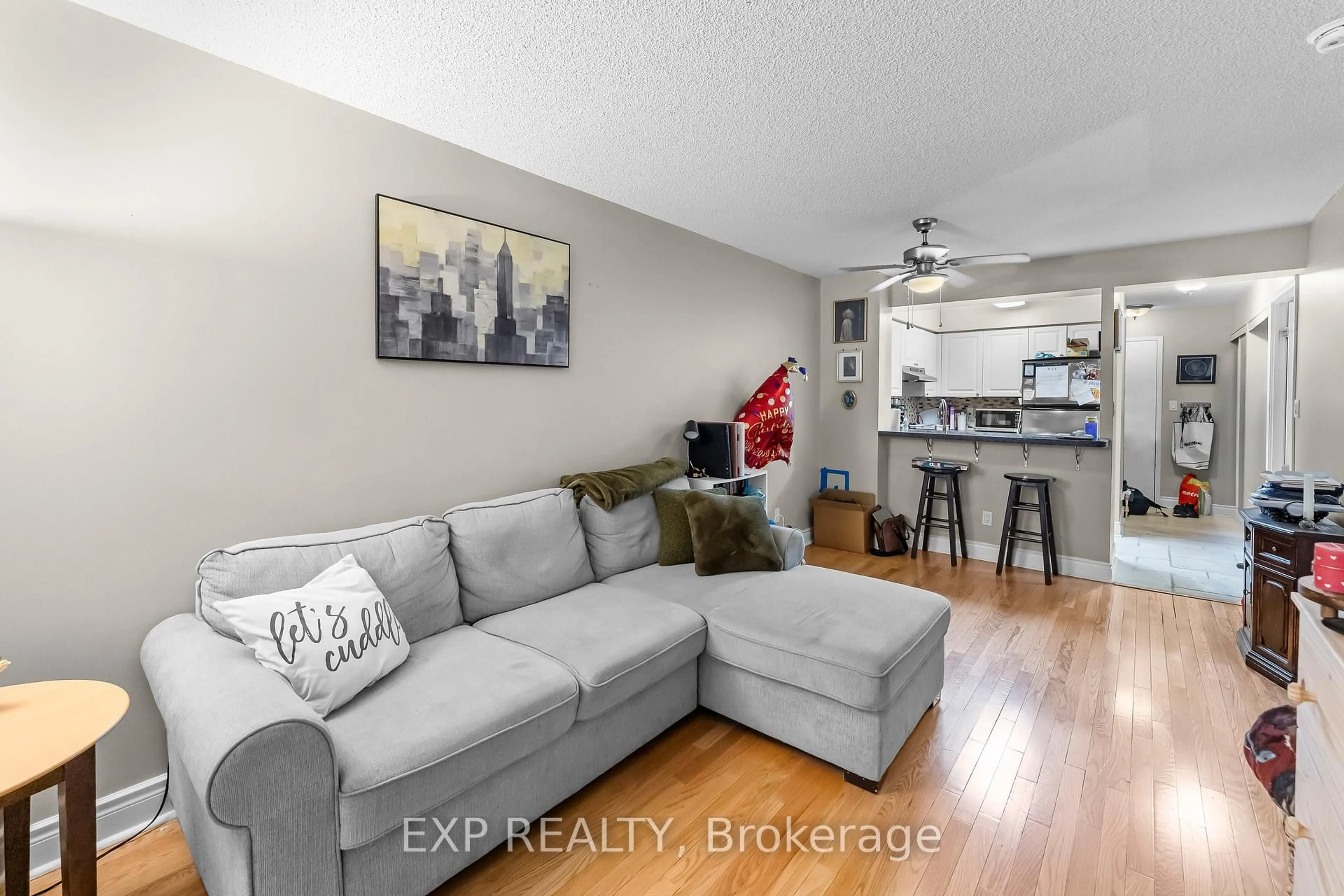 Living room with furniture, wood/laminate floor for 398 Eglinton Ave #308, Toronto Ontario M4P 3H8