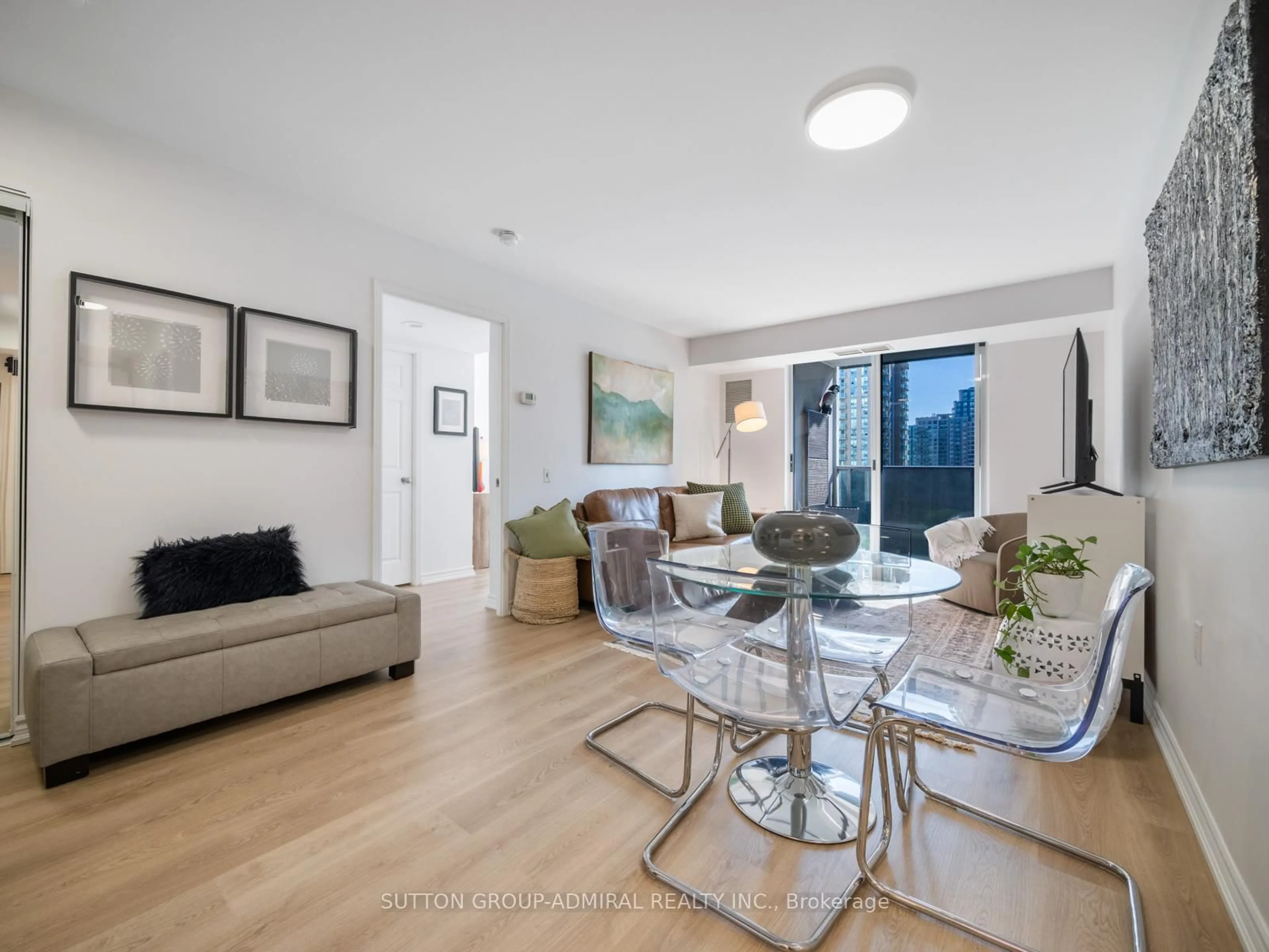 Living room with furniture, wood/laminate floor for 35 Finch Ave #1112, Toronto Ontario M2N 6Z8