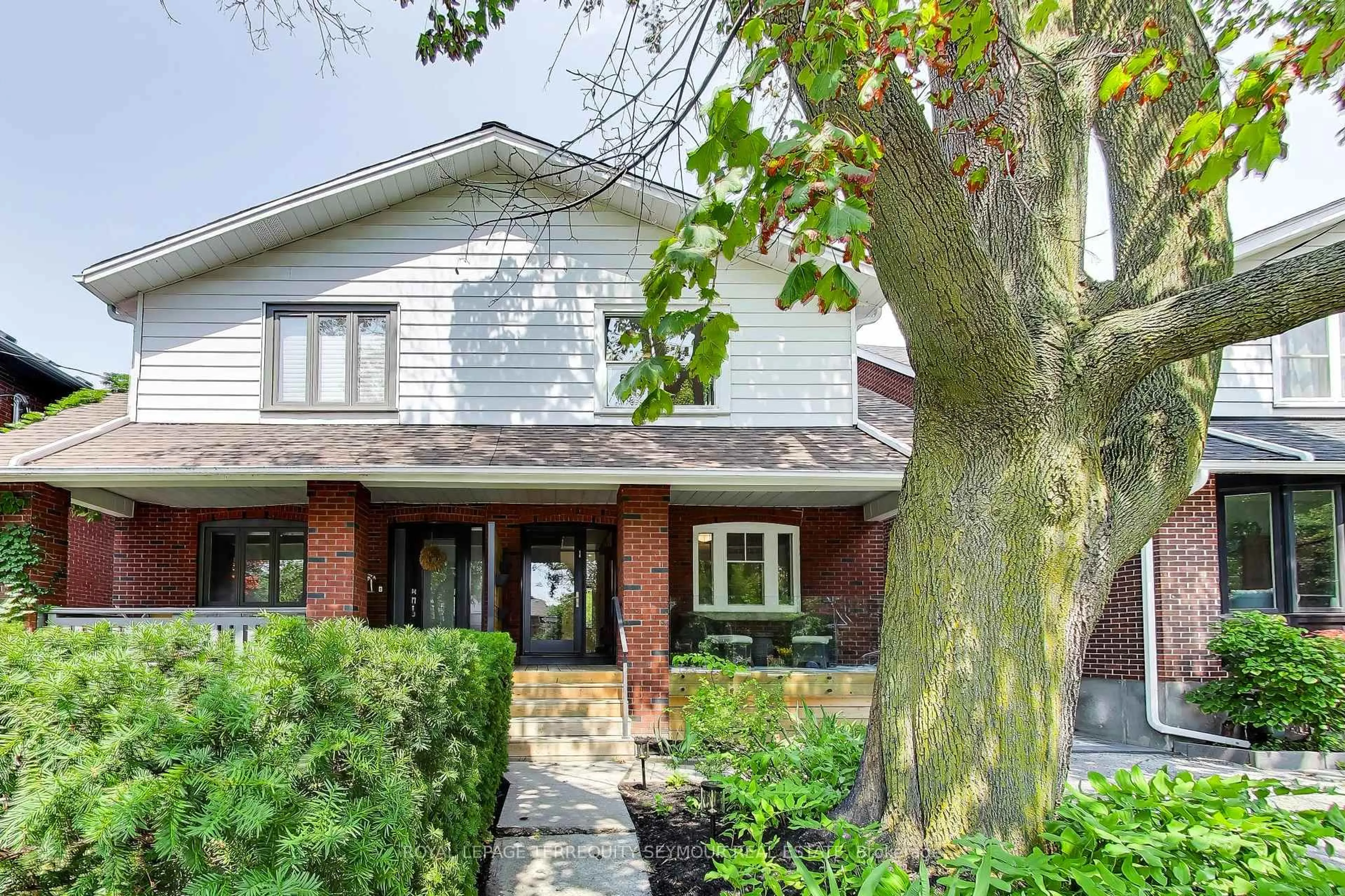 Home with brick exterior material, street for 262 Belsize Dr, Toronto Ontario M4S 1M6