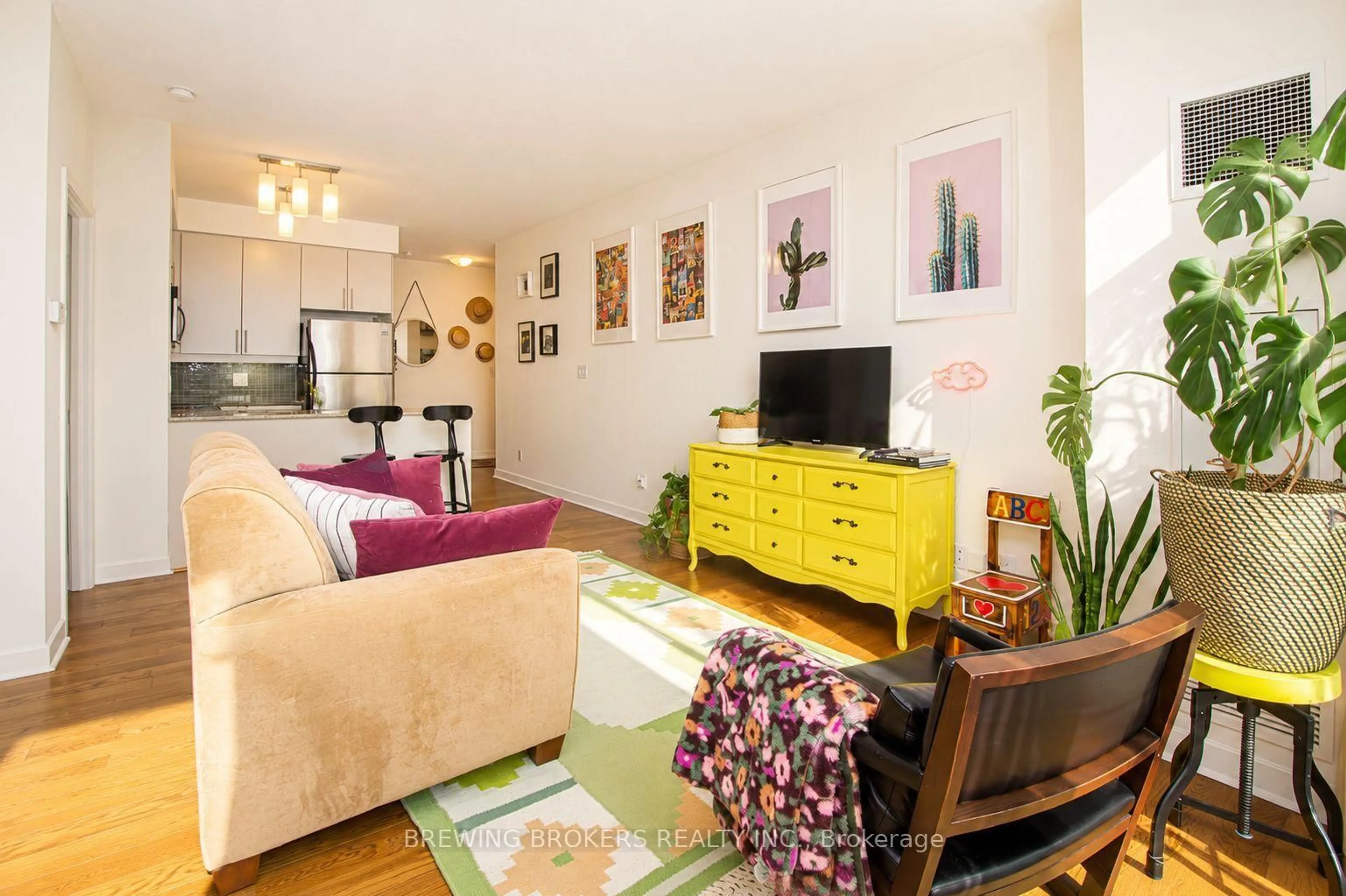 Living room with furniture, wood/laminate floor for 18 Harbour St #1702, Toronto Ontario M5J 2Z6