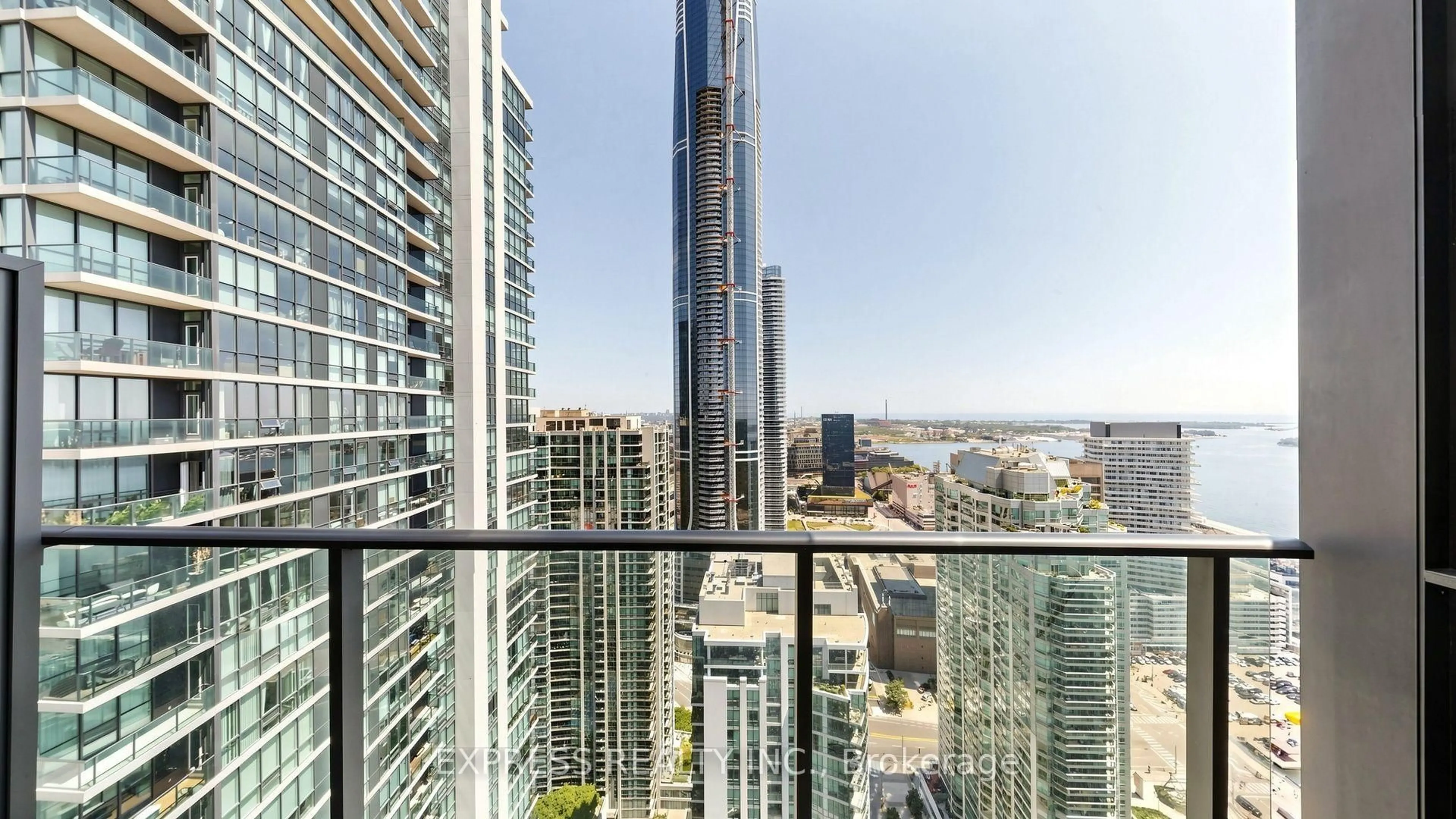 Balcony in the apartment, city buildings view from balcony for 33 Bay St #4207, Toronto Ontario M5J 2Z3