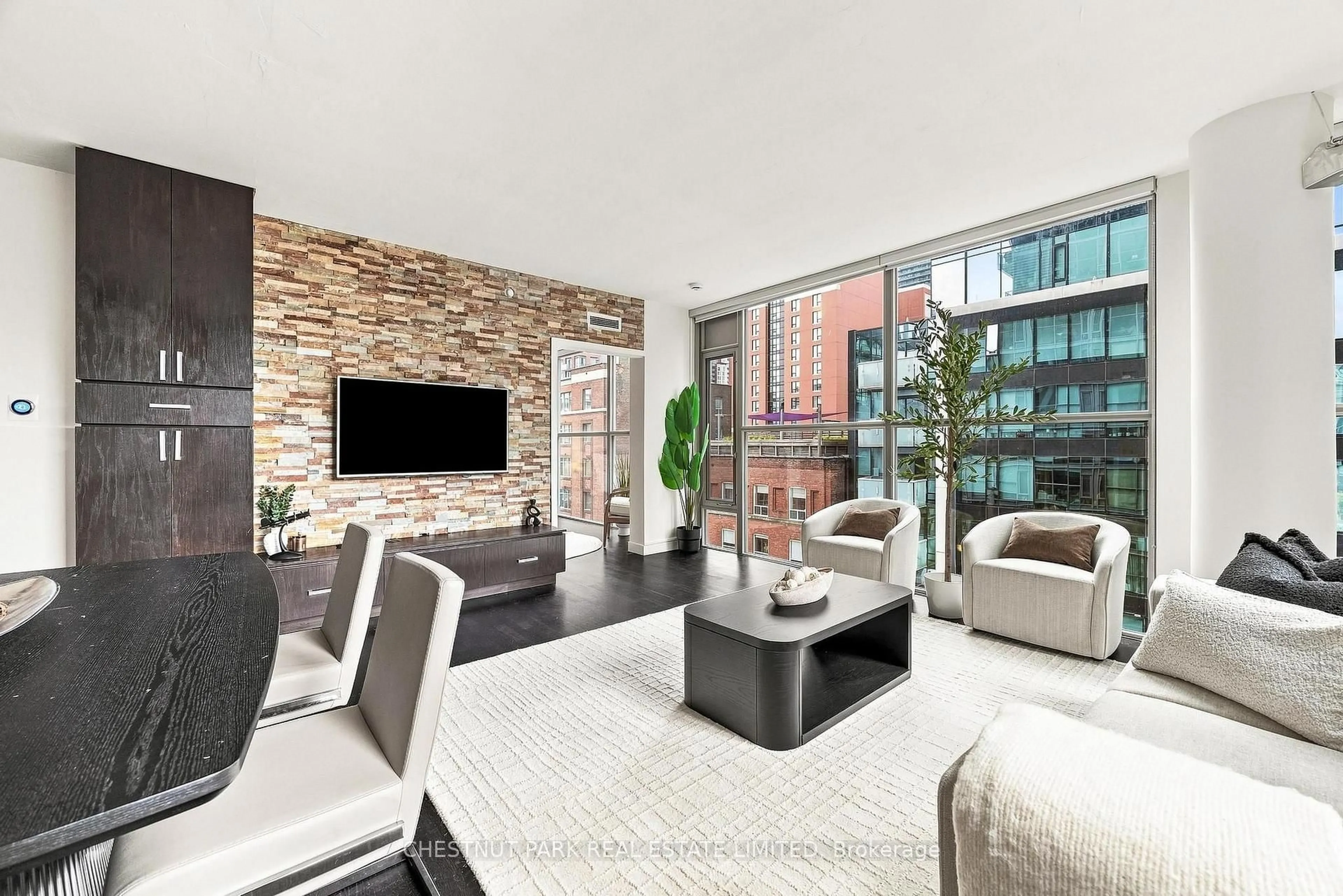 Living room with furniture, ceramic/tile floor for 25 Oxley St #611, Toronto Ontario M5V 2J5
