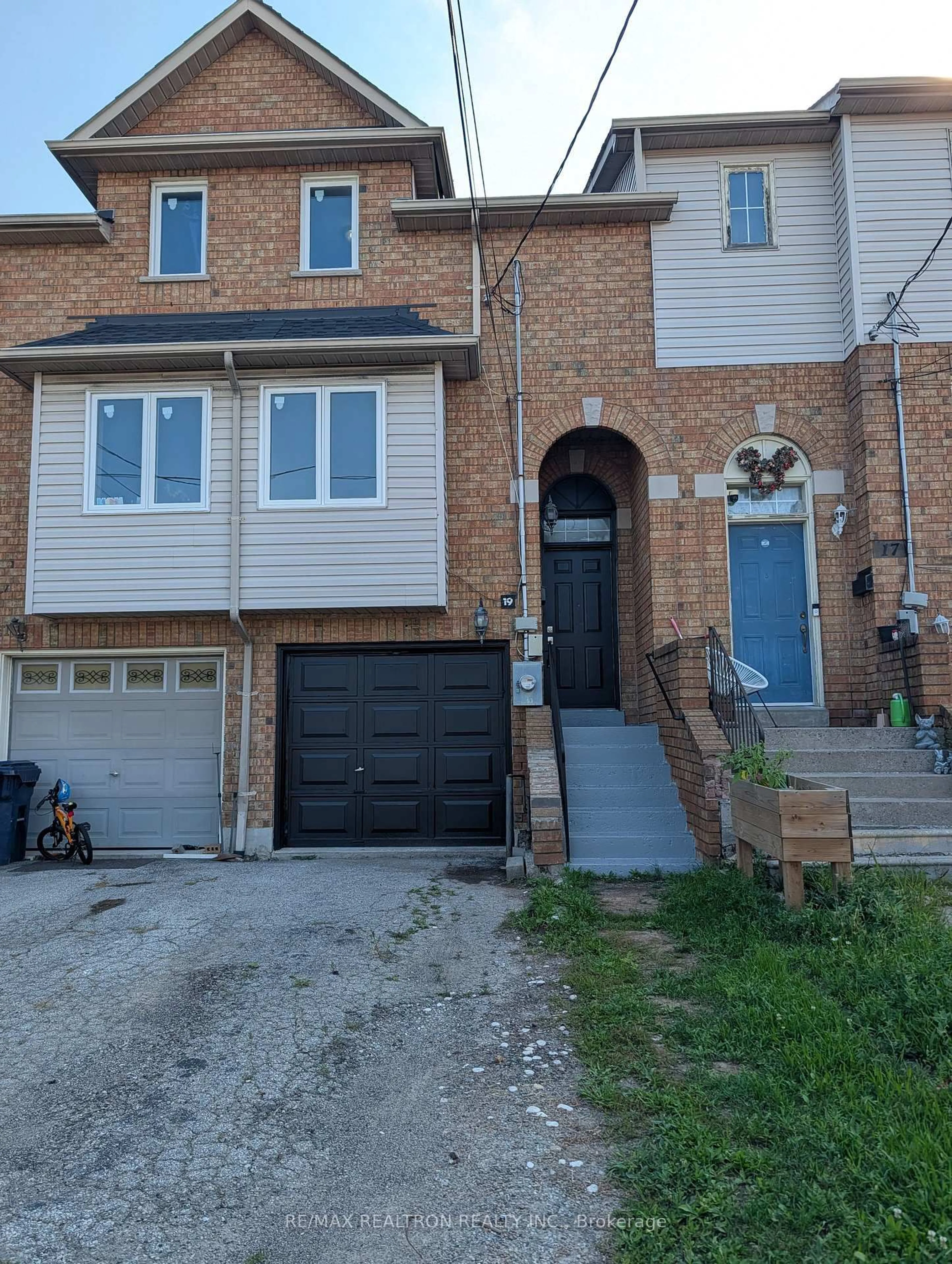Home with brick exterior material, street for 19 WARNER Ave, Toronto Ontario M4A 2X1