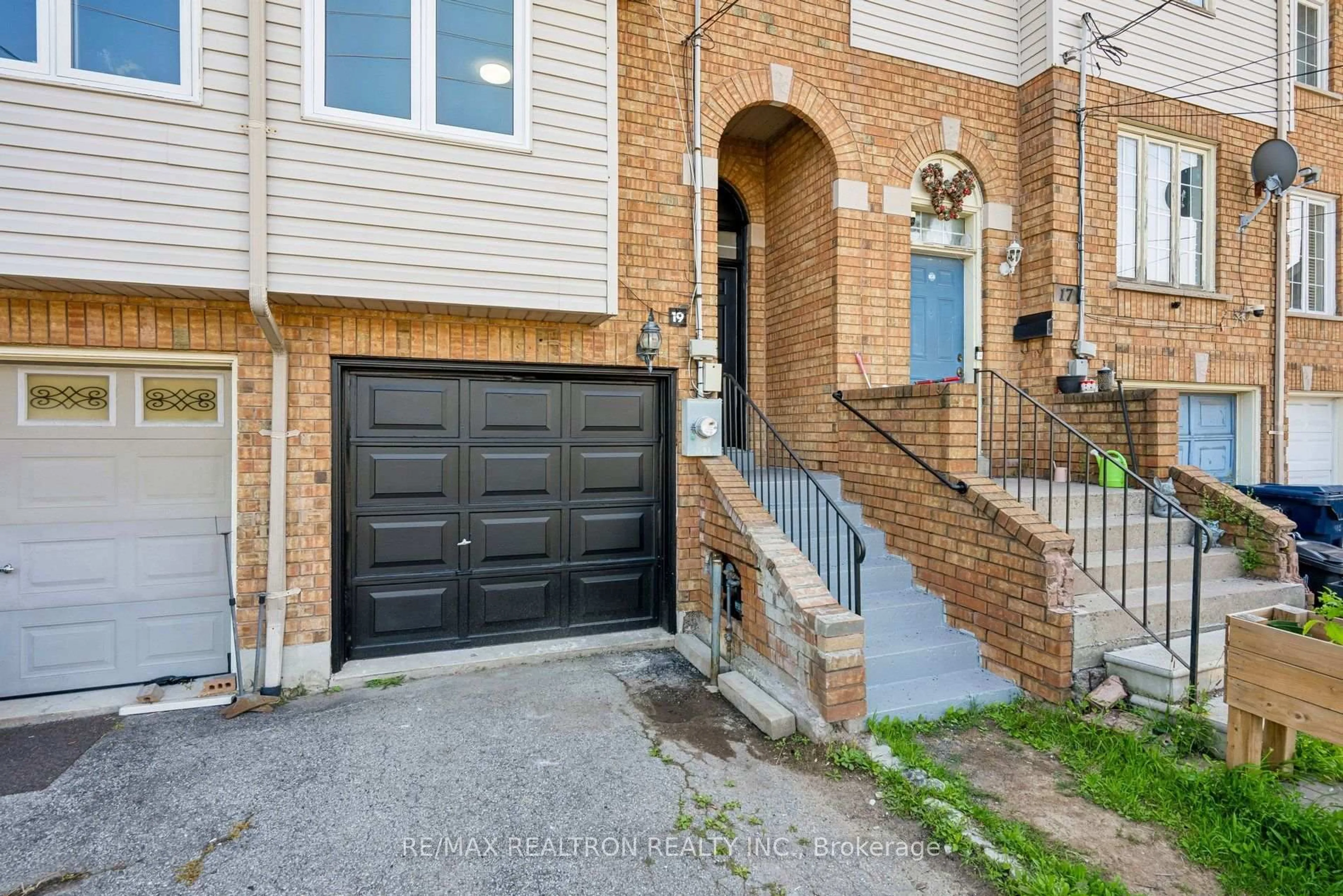Home with brick exterior material, street for 19 WARNER Ave, Toronto Ontario M4A 2X1
