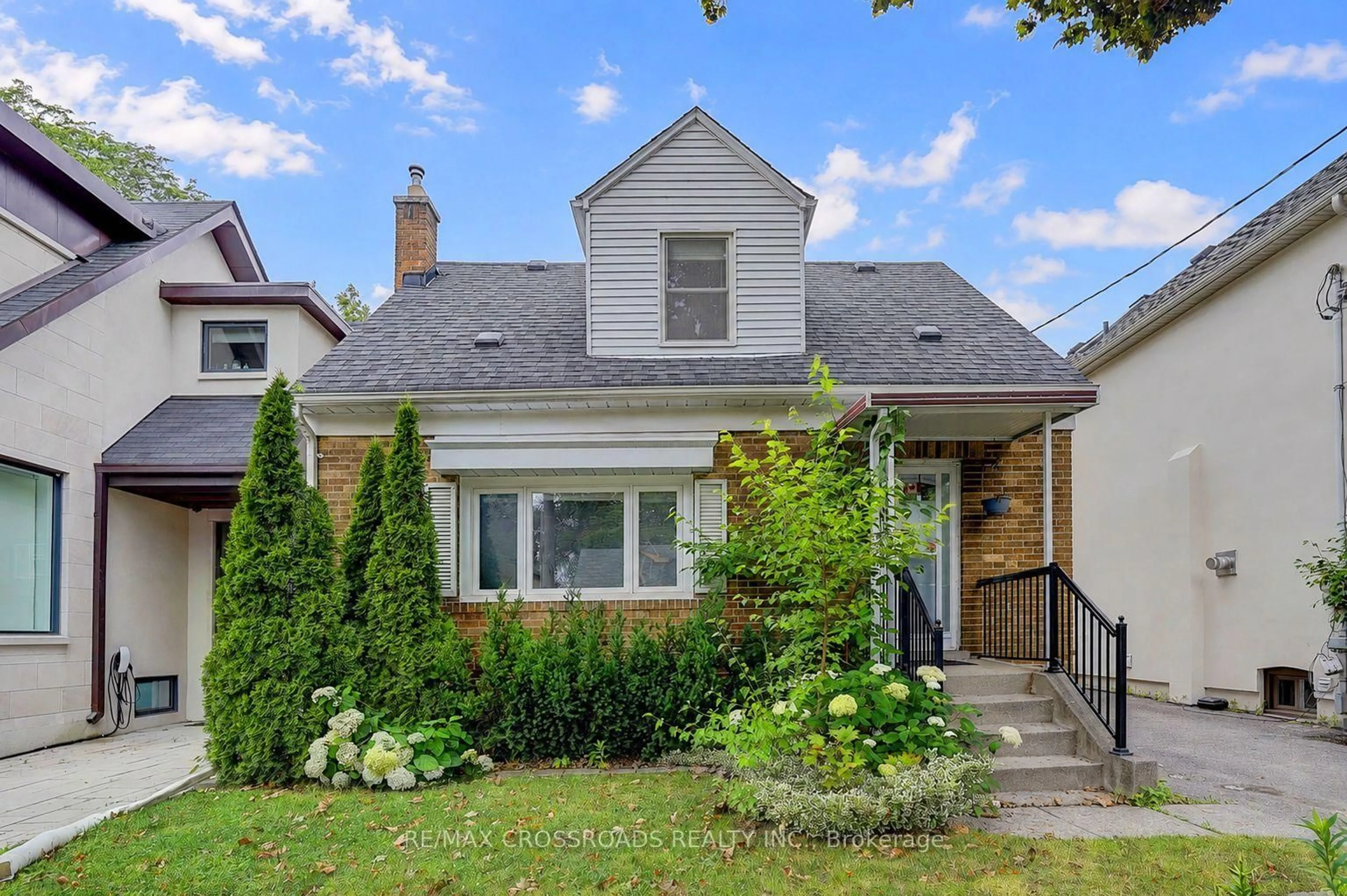 Home with brick exterior material, street for 128 Leacrest Rd, Toronto Ontario M4G 1E8