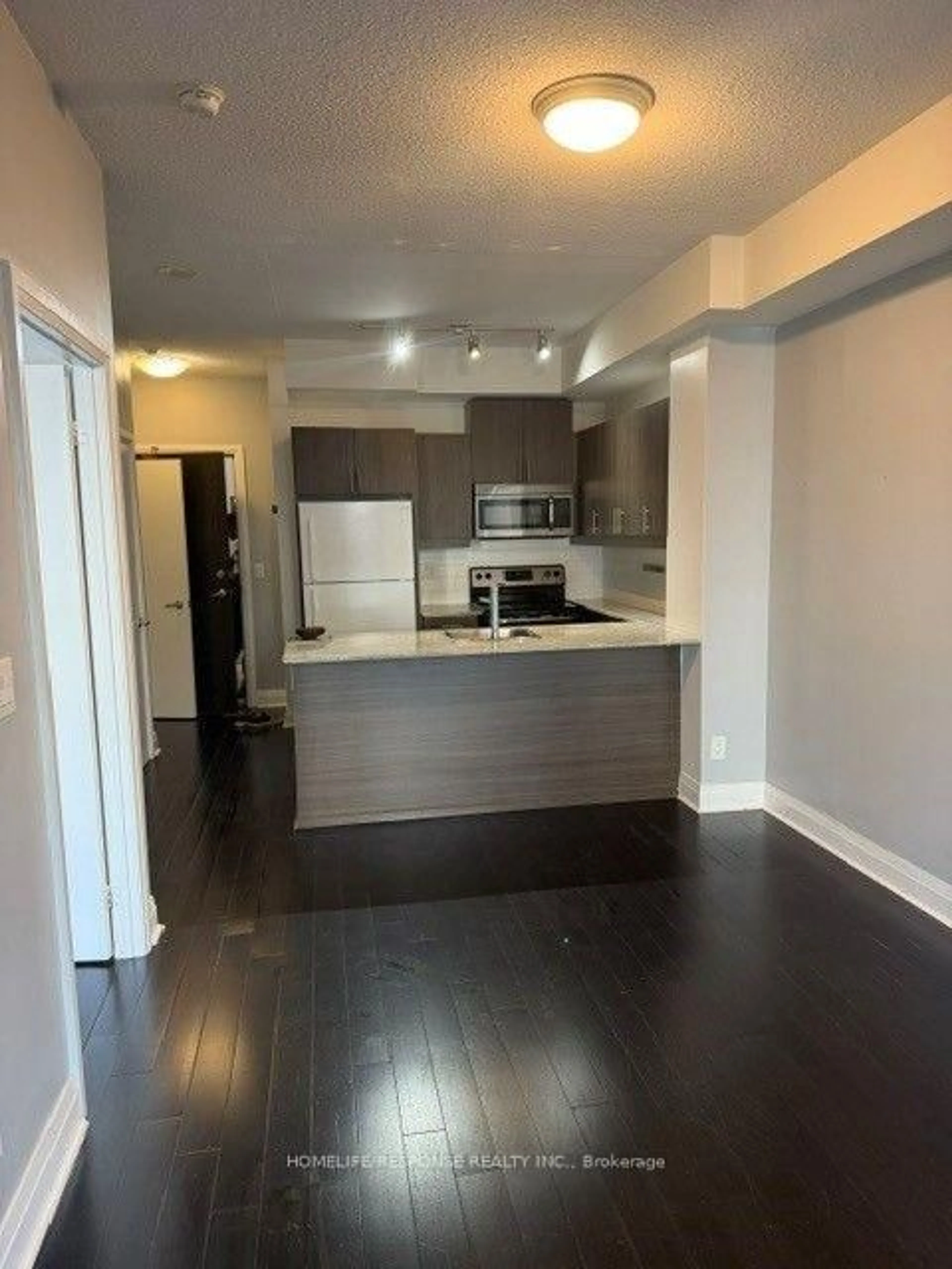 Open concept kitchen, wood/laminate floor for 17 KENASTON Gdns #418, Toronto Ontario M2K 0B9