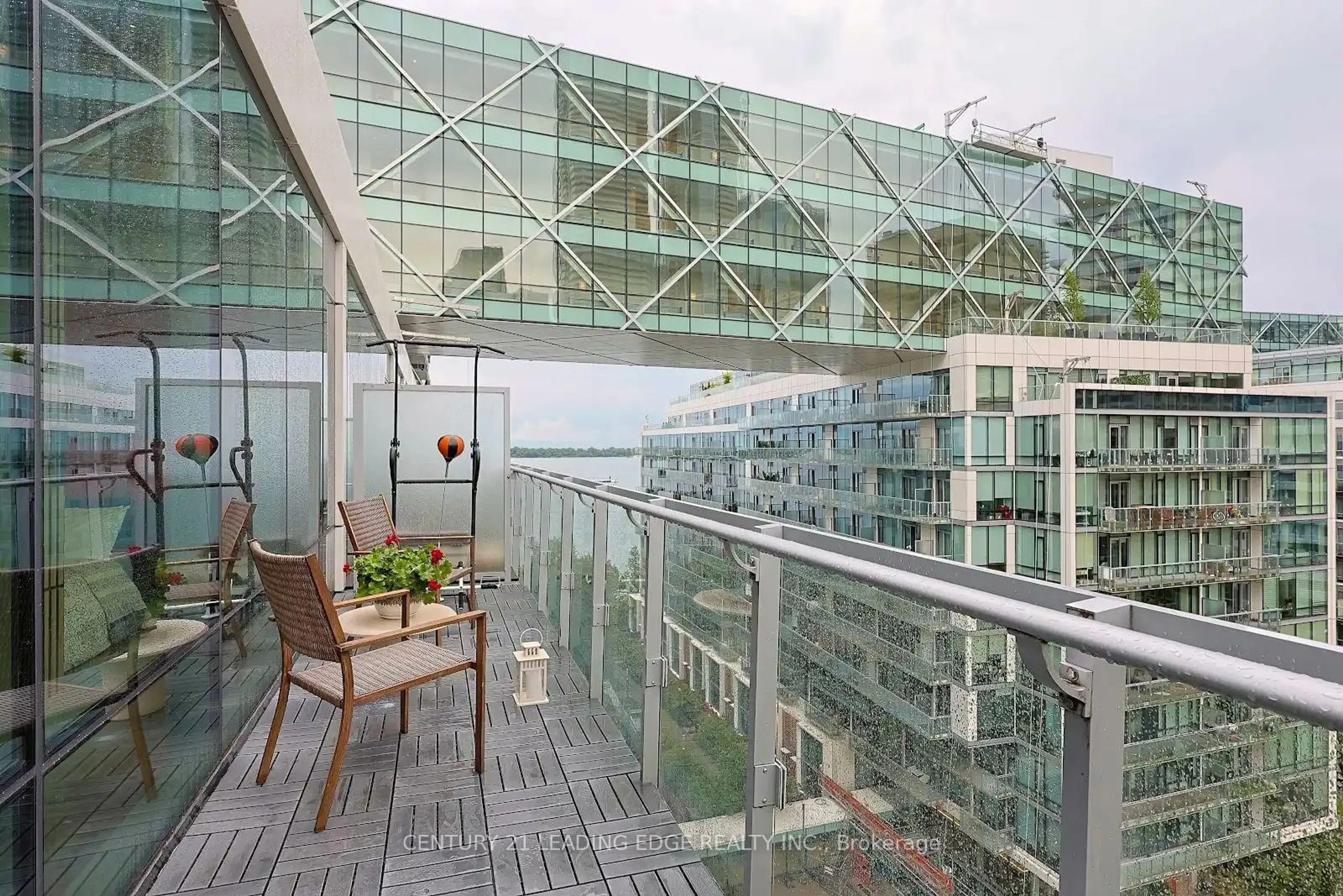 Balcony in the apartment, city buildings view from balcony for 39 Queens Quay #1036, Toronto Ontario M5E 0A5
