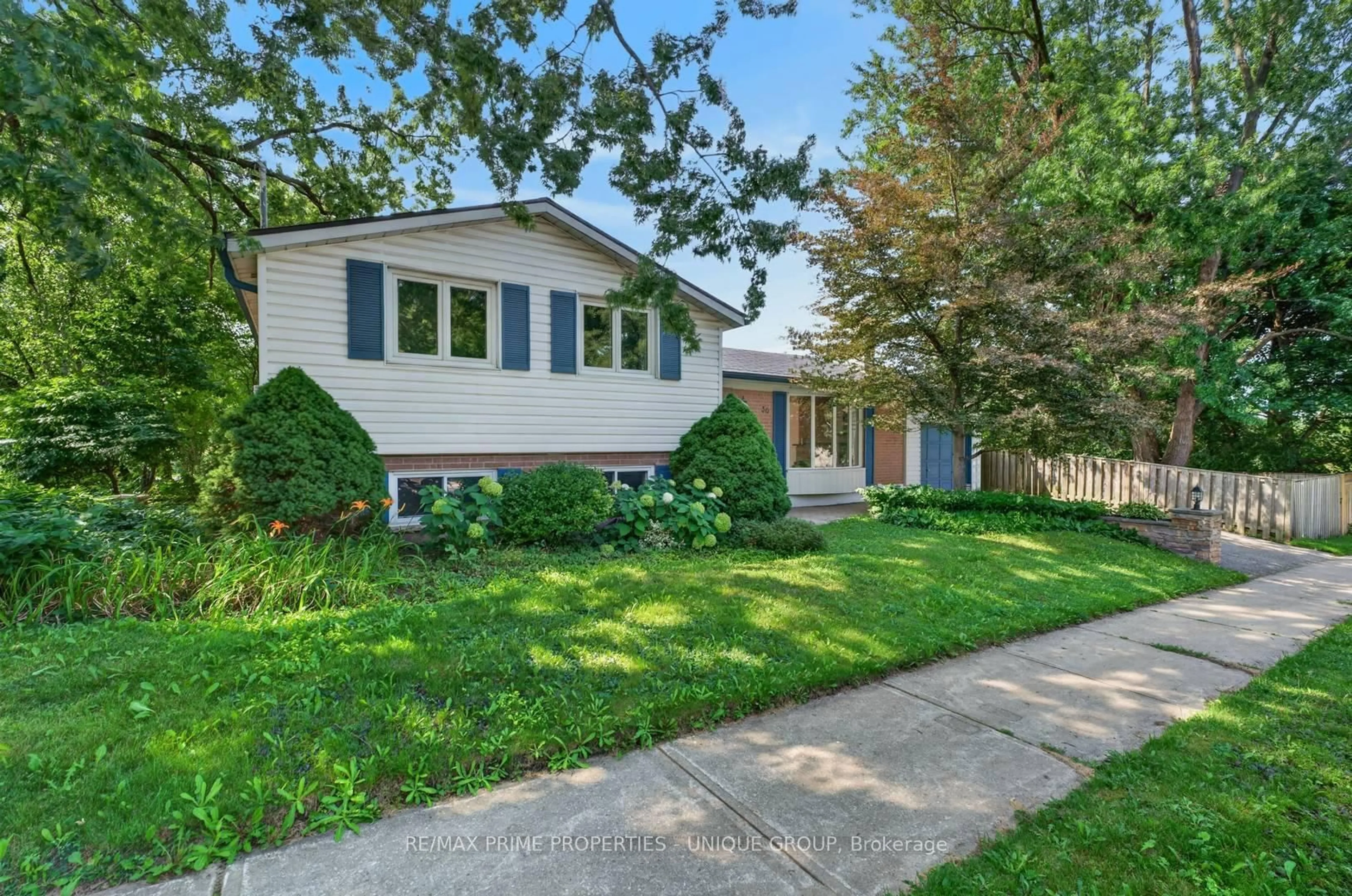 Home with vinyl exterior material, street for 36 Dallington Dr, Toronto Ontario M2J 2G3