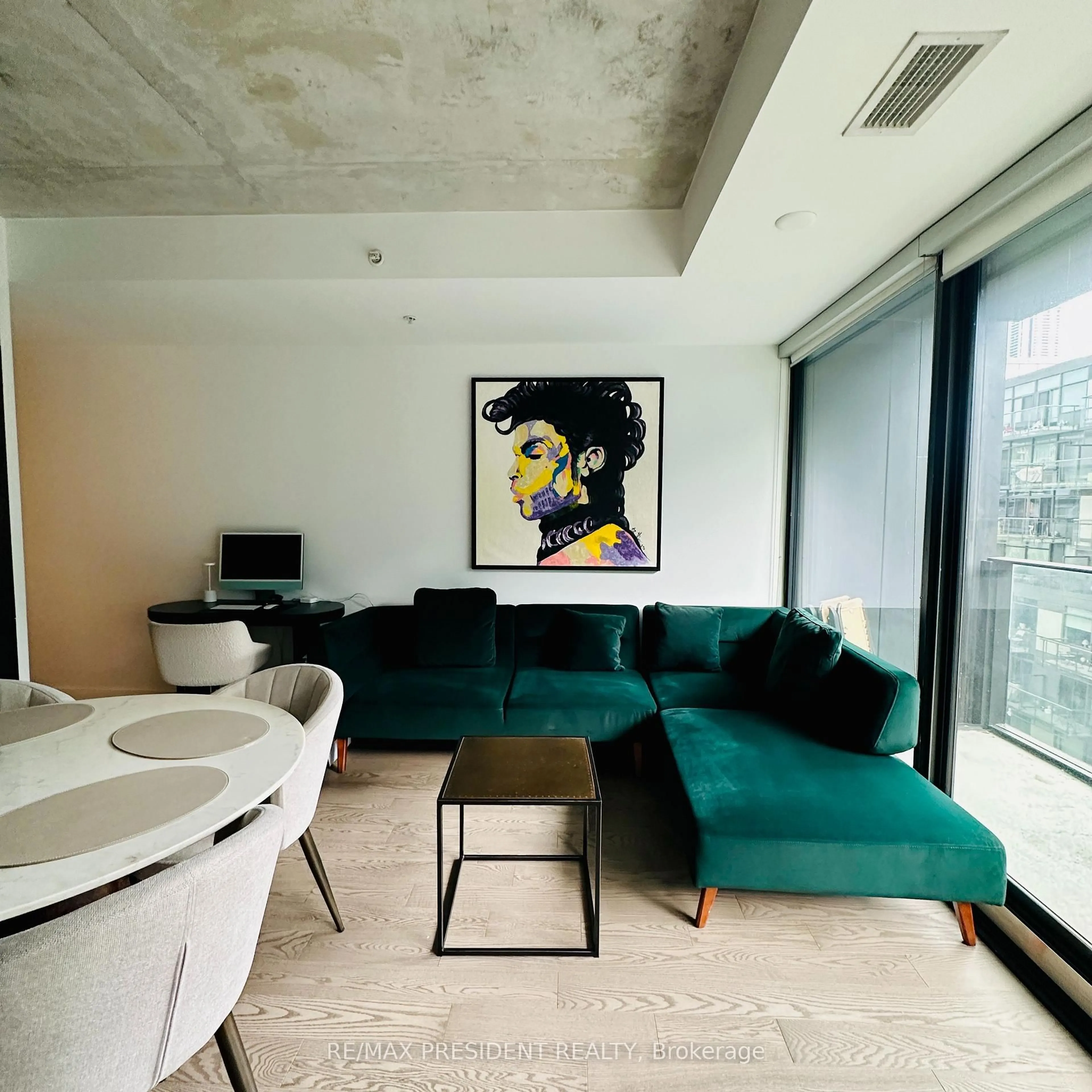 Living room with furniture, cement floor for 38 Stewart St #703, Toronto Ontario M5H 0H1