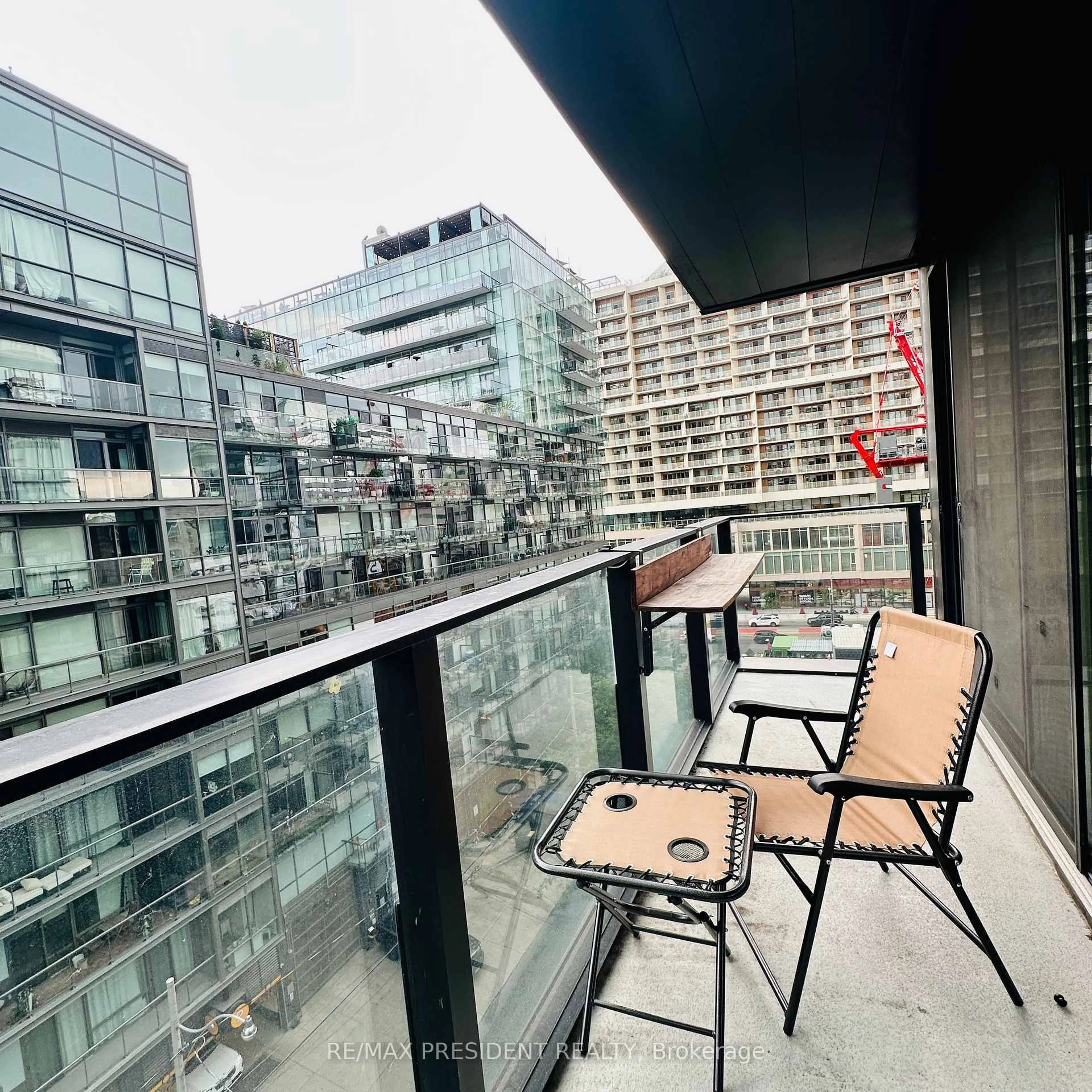 Balcony in the apartment, city buildings view from balcony for 38 Stewart St #703, Toronto Ontario M5H 0H1