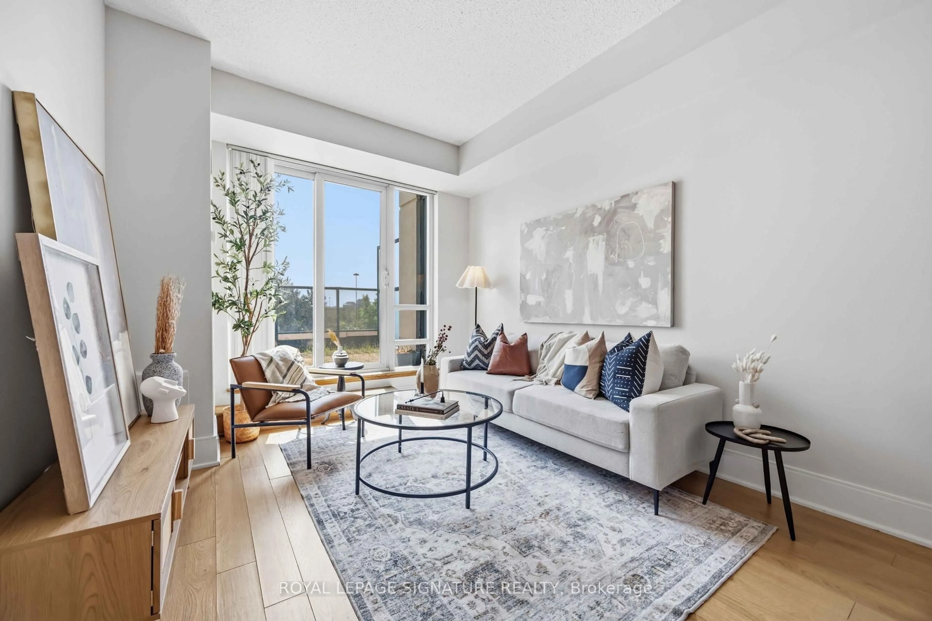 Living room with furniture, unknown for 181 Wynford Dr #403, Toronto Ontario M3C 0C6