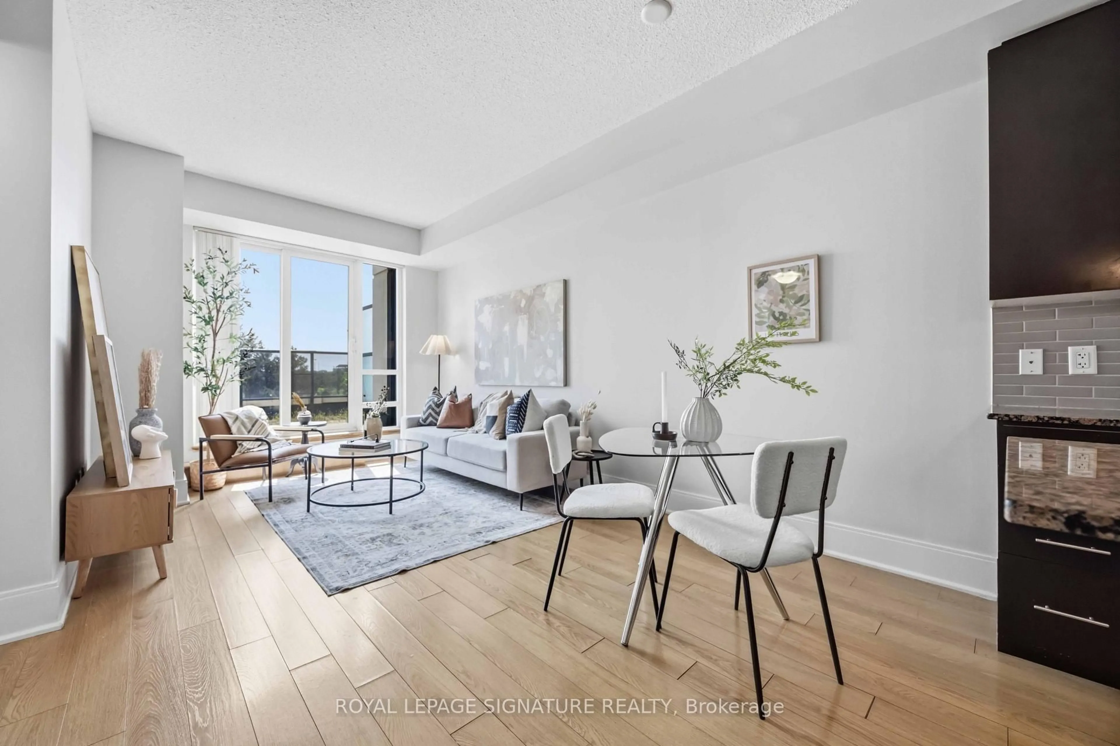 Living room with furniture, unknown for 181 Wynford Dr #403, Toronto Ontario M3C 0C6