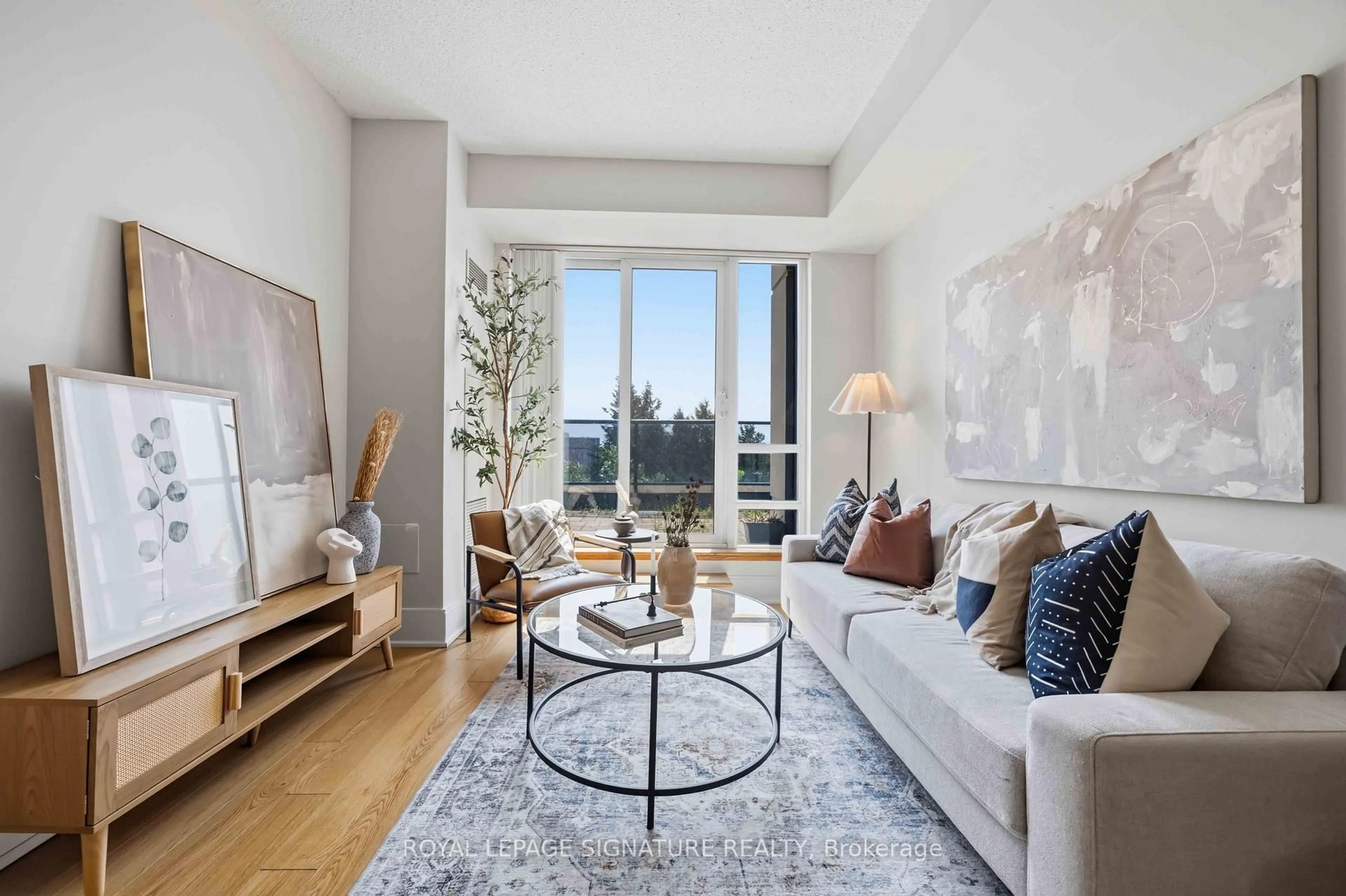 Living room with furniture, unknown for 181 Wynford Dr #403, Toronto Ontario M3C 0C6