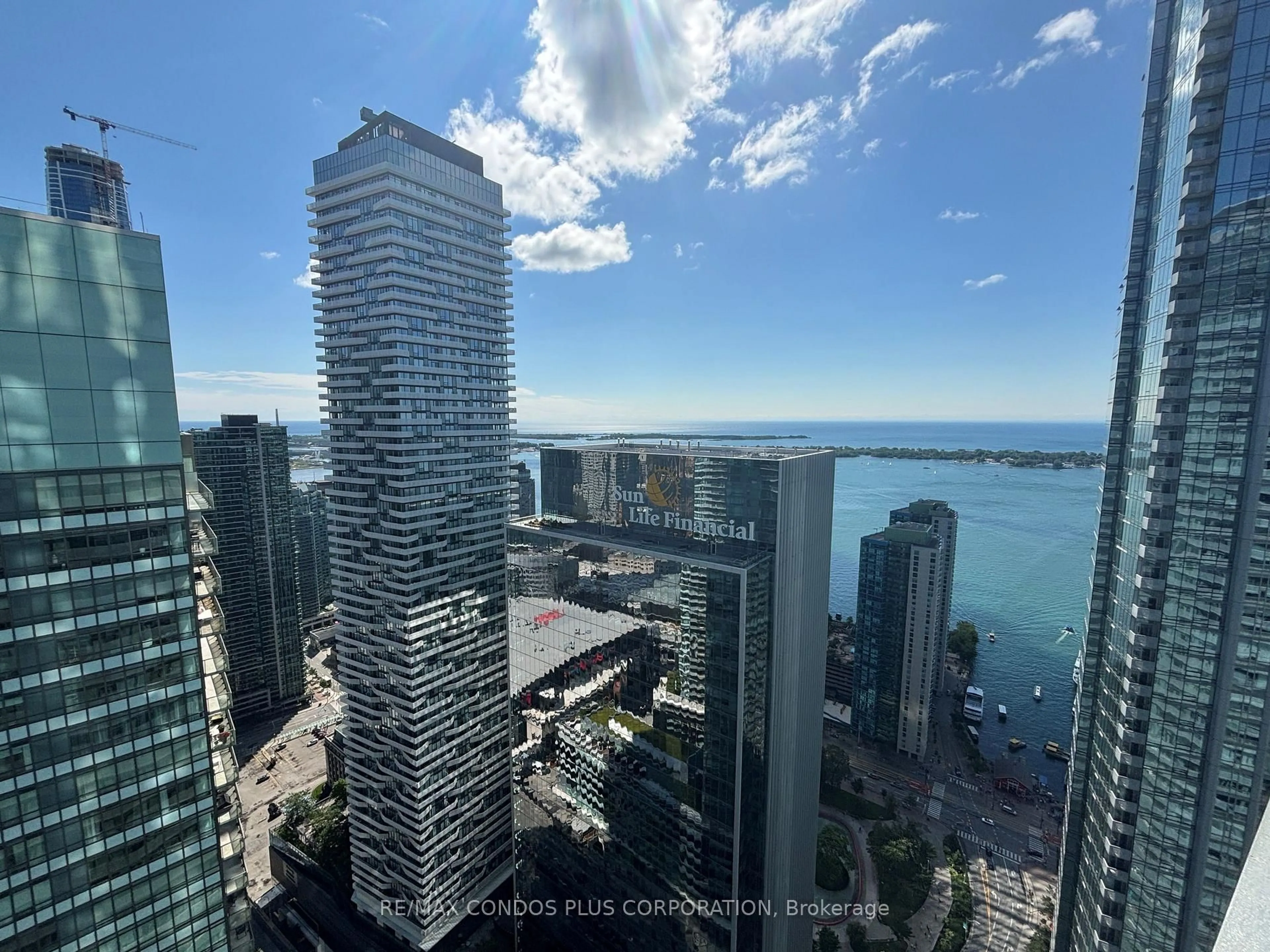 A pic from outside/outdoor area/front of a property/back of a property/a pic from drone, city buildings view from balcony for 14 York St #5102, Toronto Ontario M5J 0B1