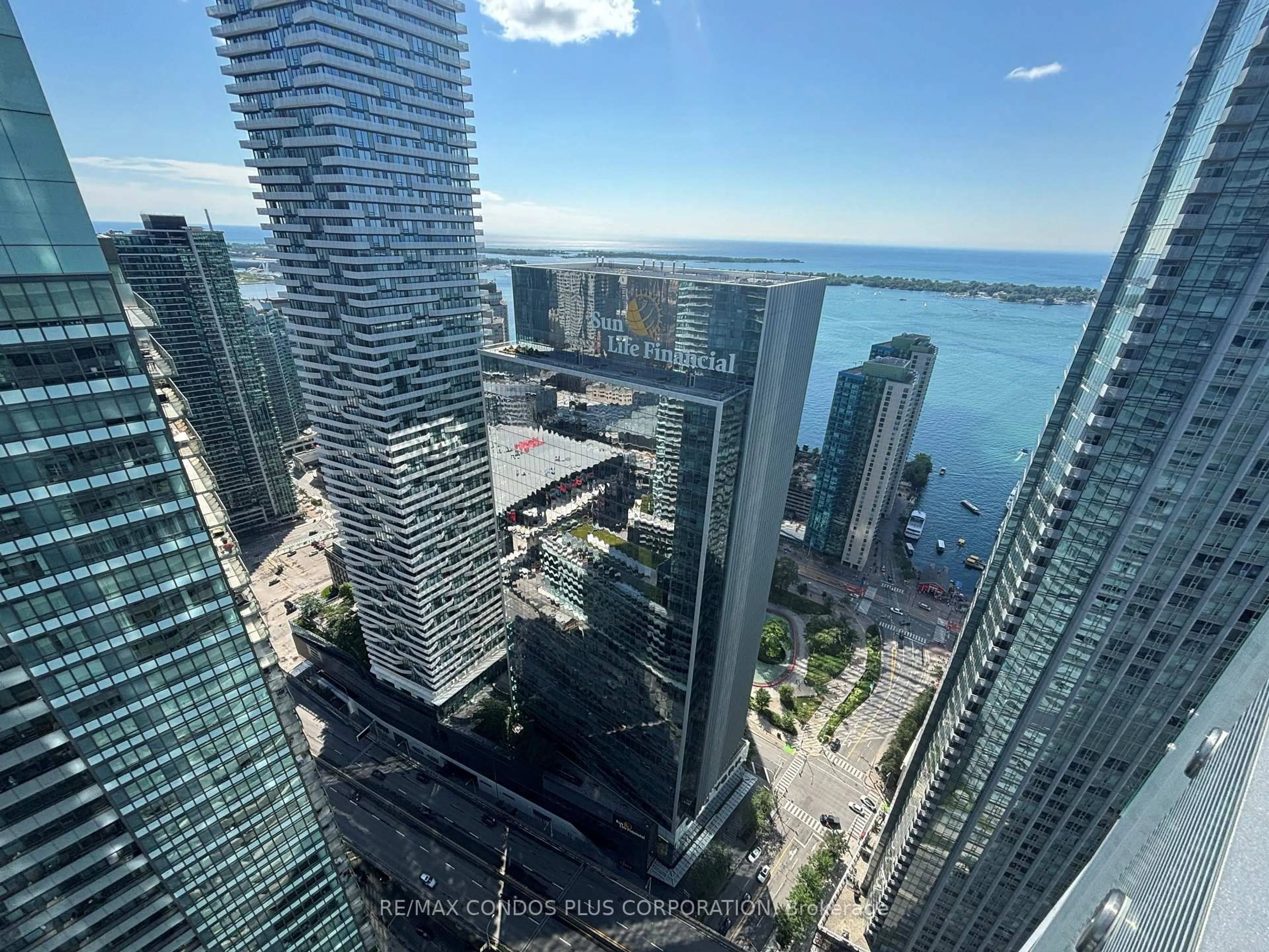 A pic from outside/outdoor area/front of a property/back of a property/a pic from drone, city buildings view from balcony for 14 York St #5102, Toronto Ontario M5J 0B1
