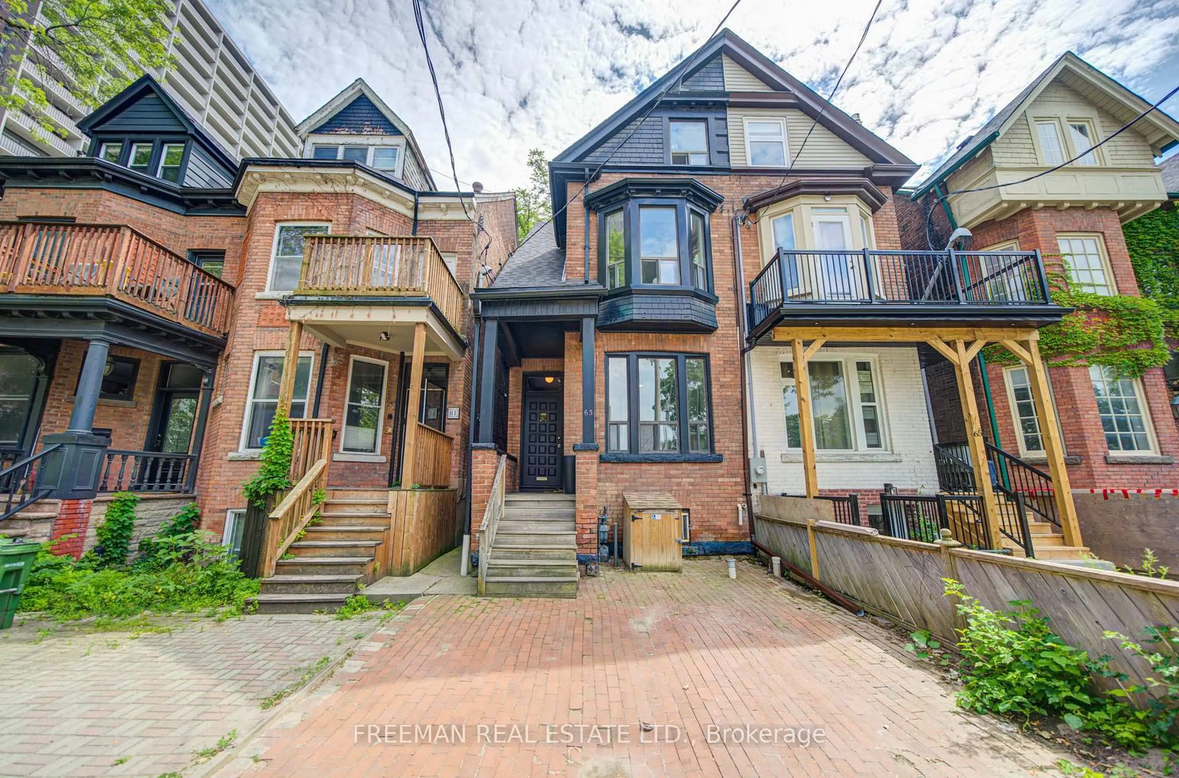 Home with brick exterior material, street for 63 Sussex Ave, Toronto Ontario M5S 1J8