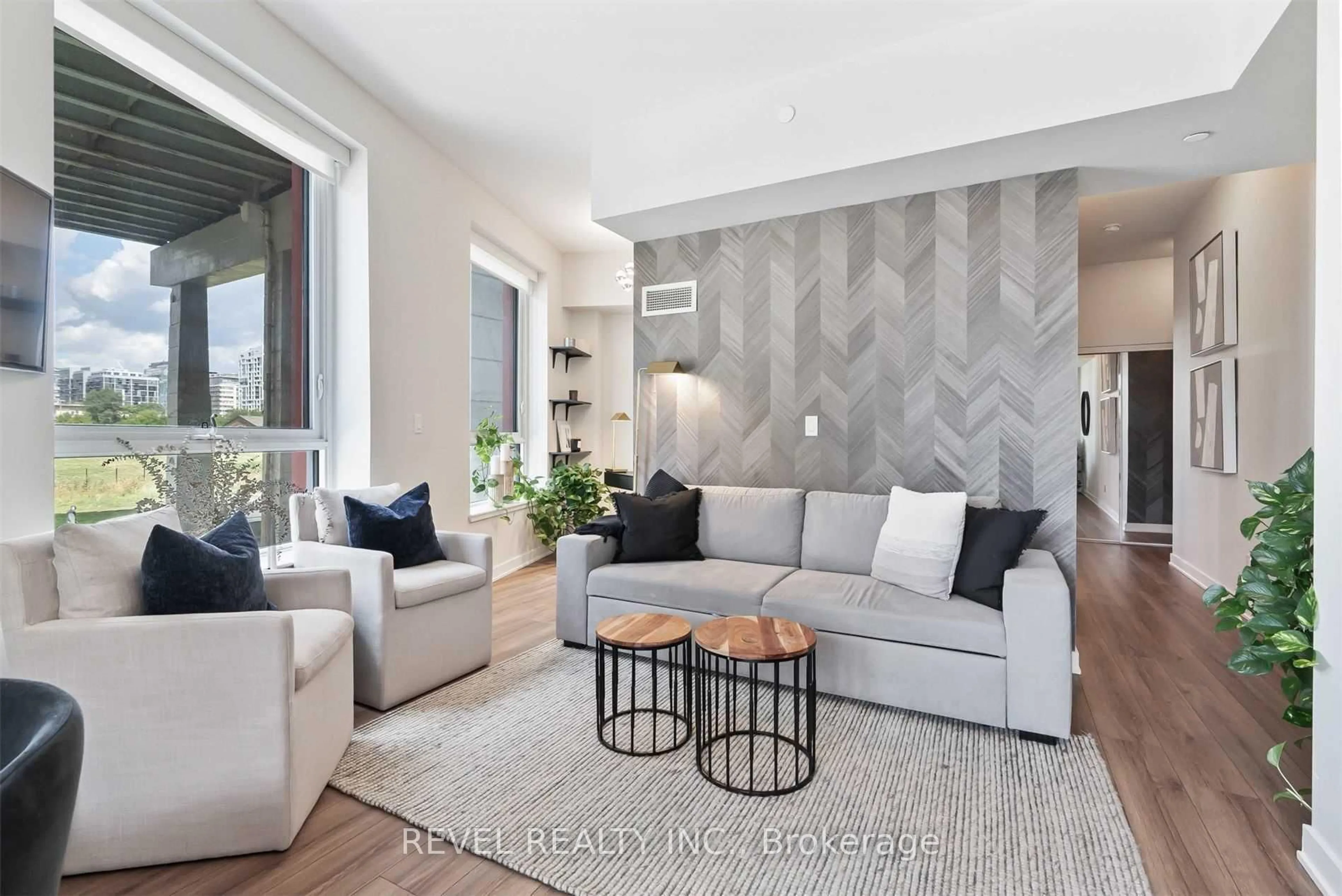 Living room with furniture, unknown for 50 Bruyeres Mews #215, Toronto Ontario M5V 0H8