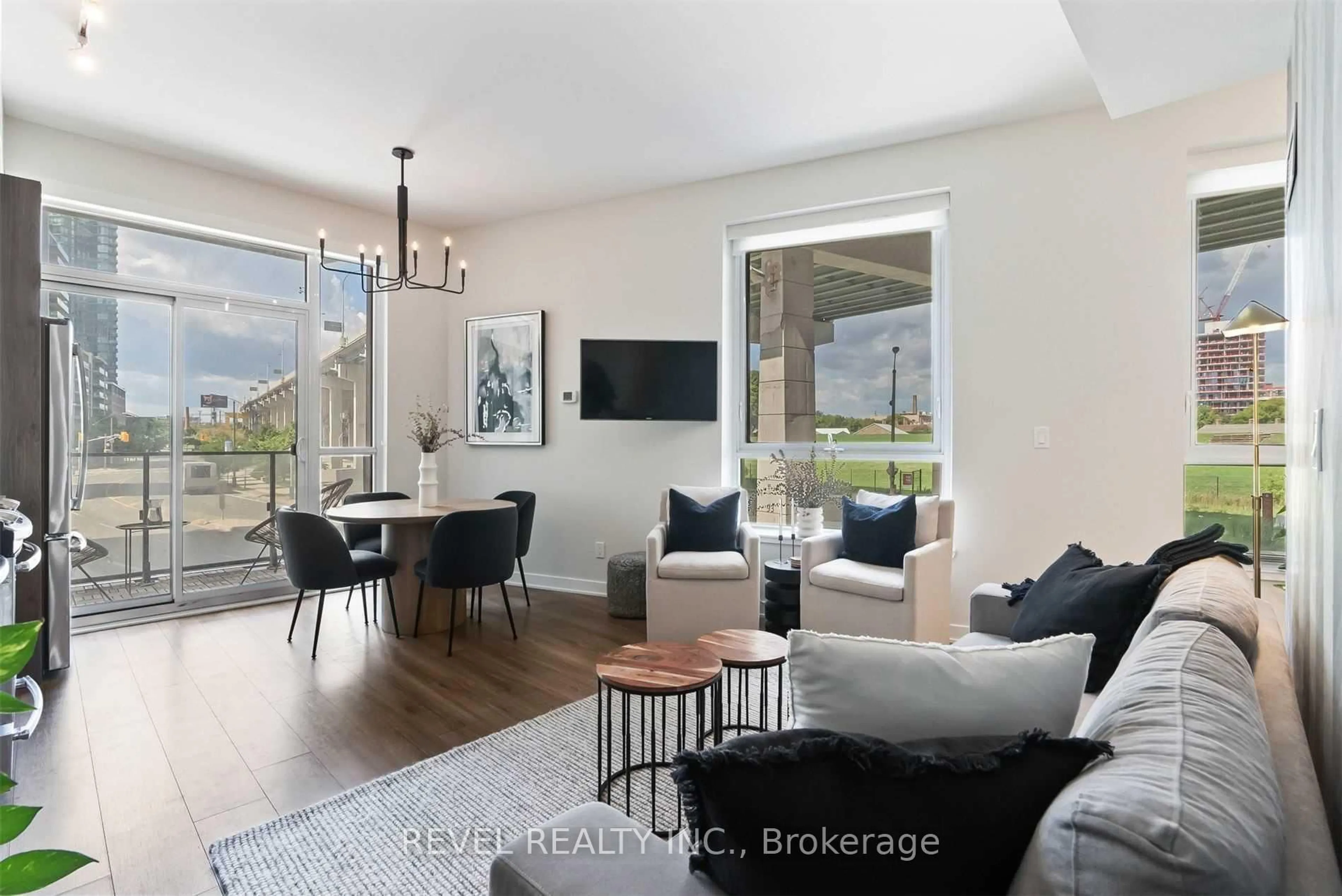 Living room with furniture, unknown for 50 Bruyeres Mews #215, Toronto Ontario M5V 0H8