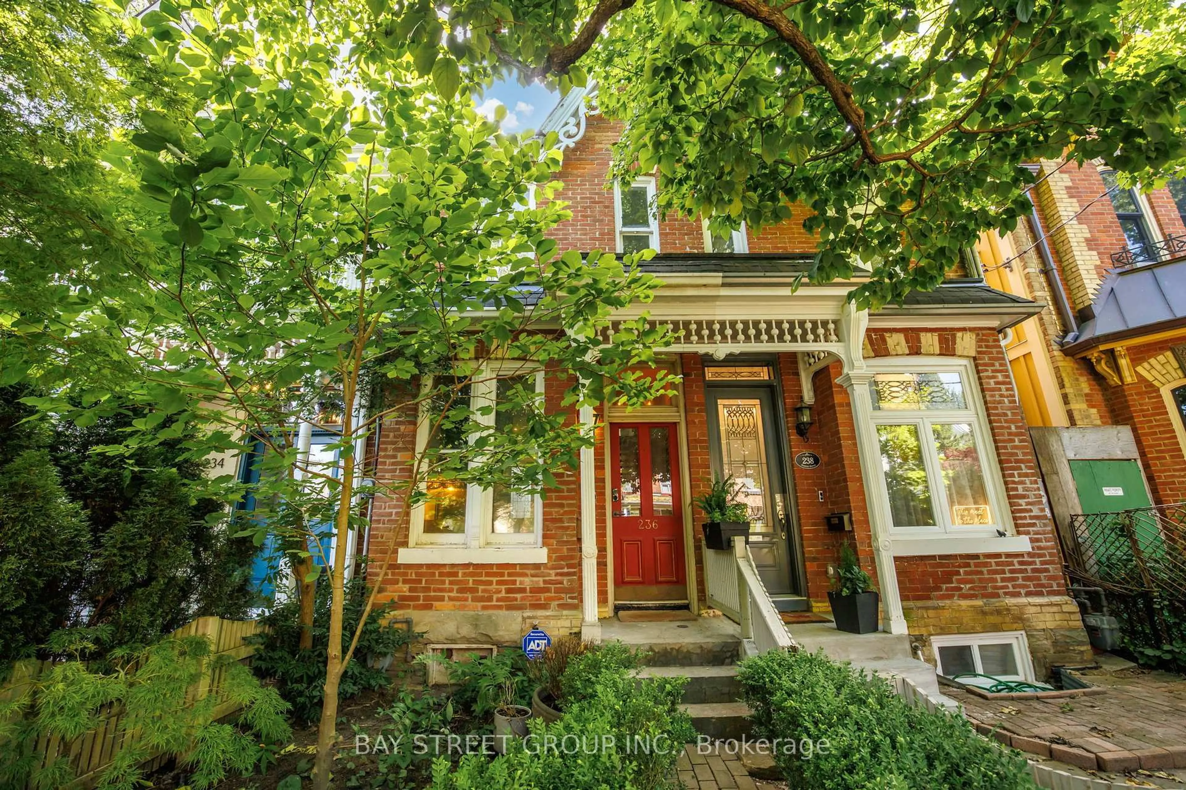 Home with brick exterior material, street for 236 Seaton St, Toronto Ontario M5A 2T4
