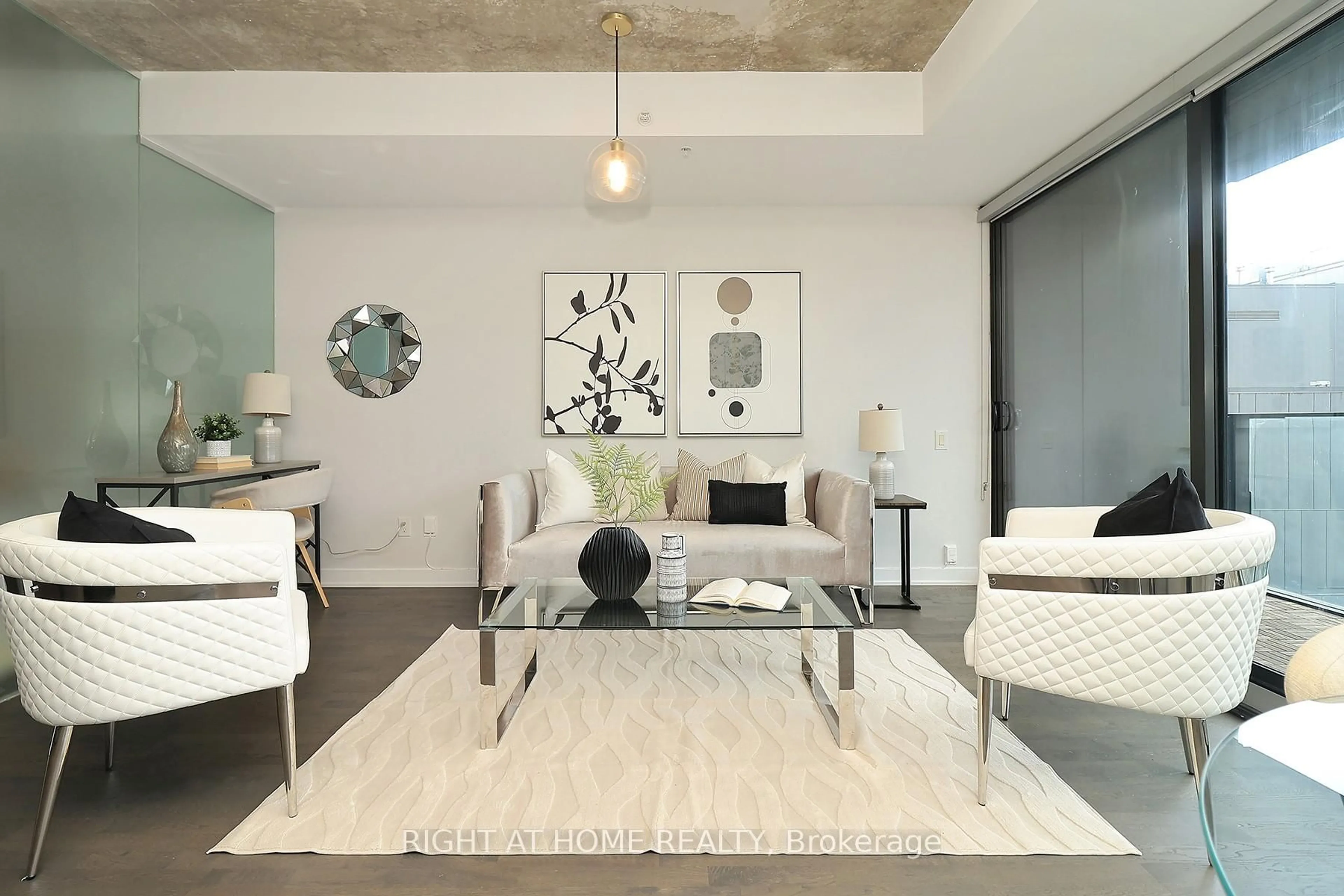Living room with furniture, cement floor for 629 King St #1112, Toronto Ontario M5V 0G9