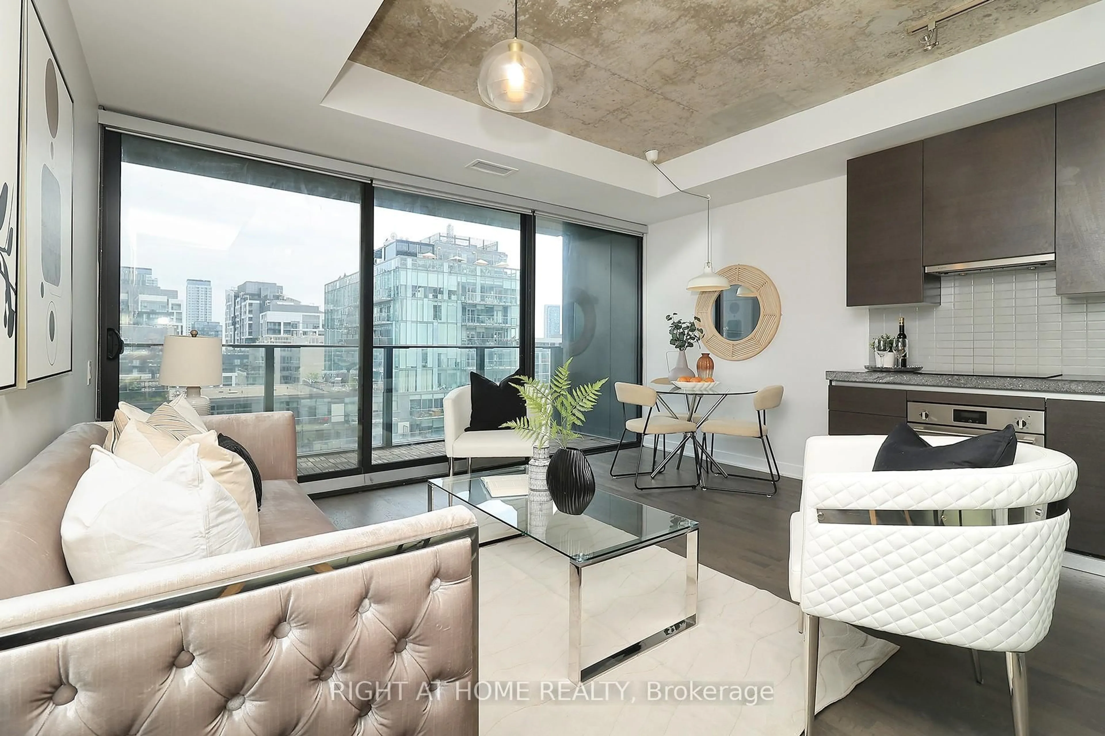 Living room with furniture, cement floor for 629 King St #1112, Toronto Ontario M5V 0G9