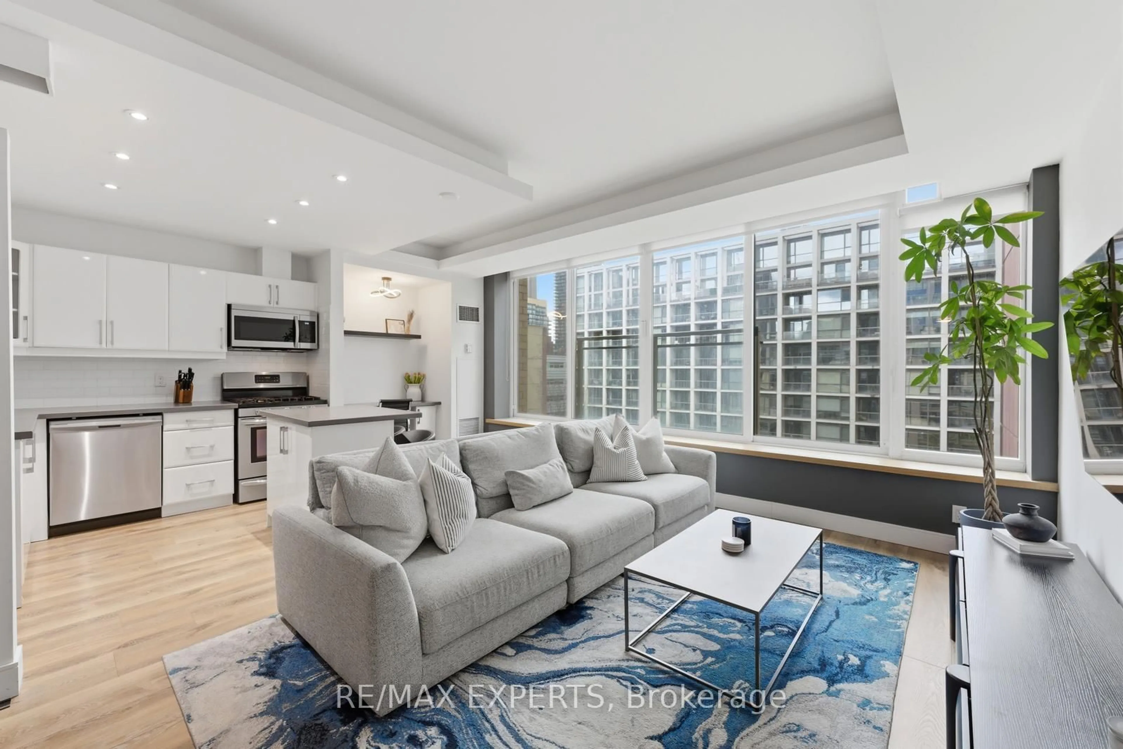 Living room with furniture, unknown for 50 Camden St #707, Toronto Ontario M5V 3N1
