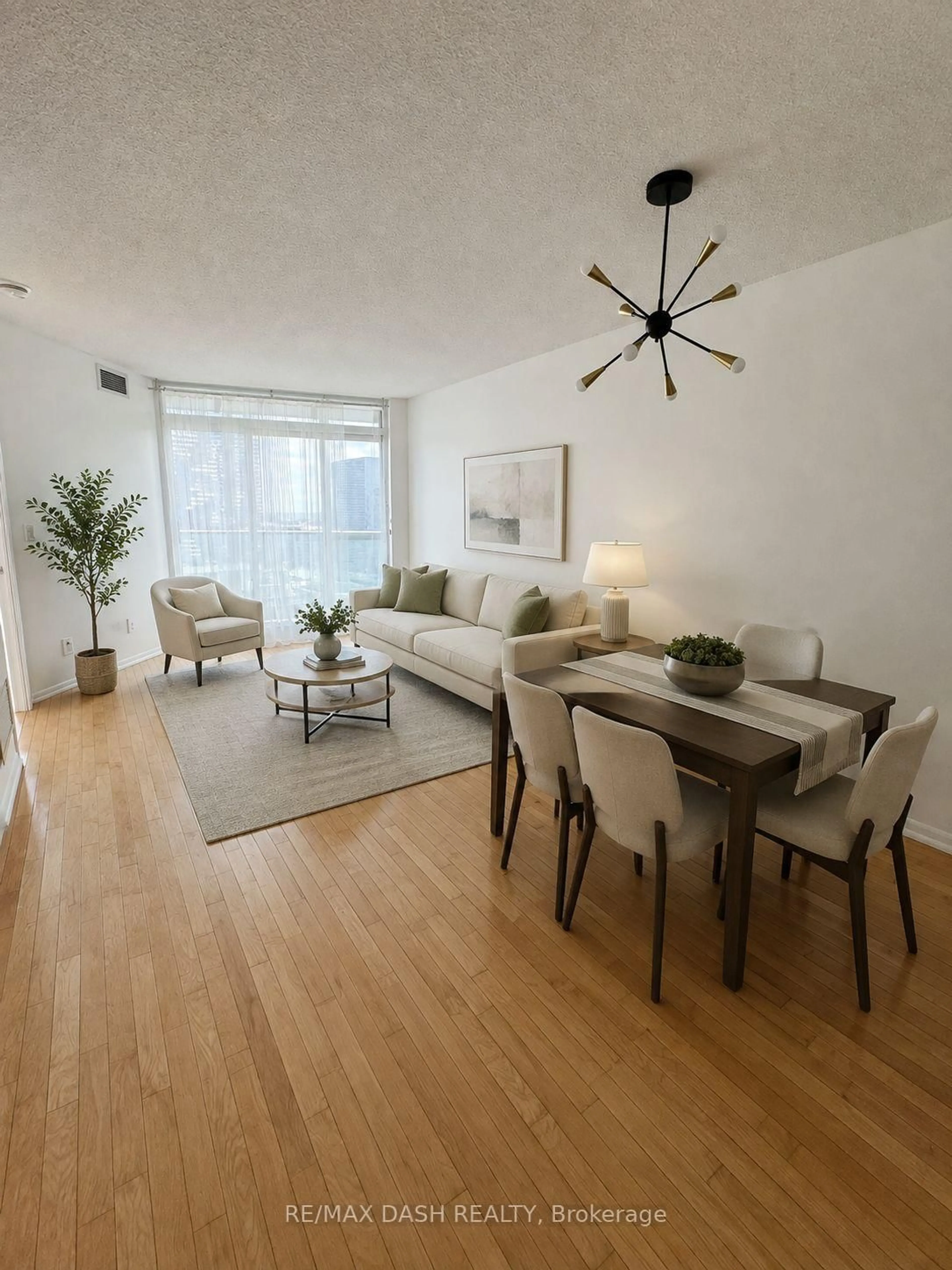 Living room with furniture, wood/laminate floor for 18 Yonge St #2809, Toronto Ontario M5E 1Z8