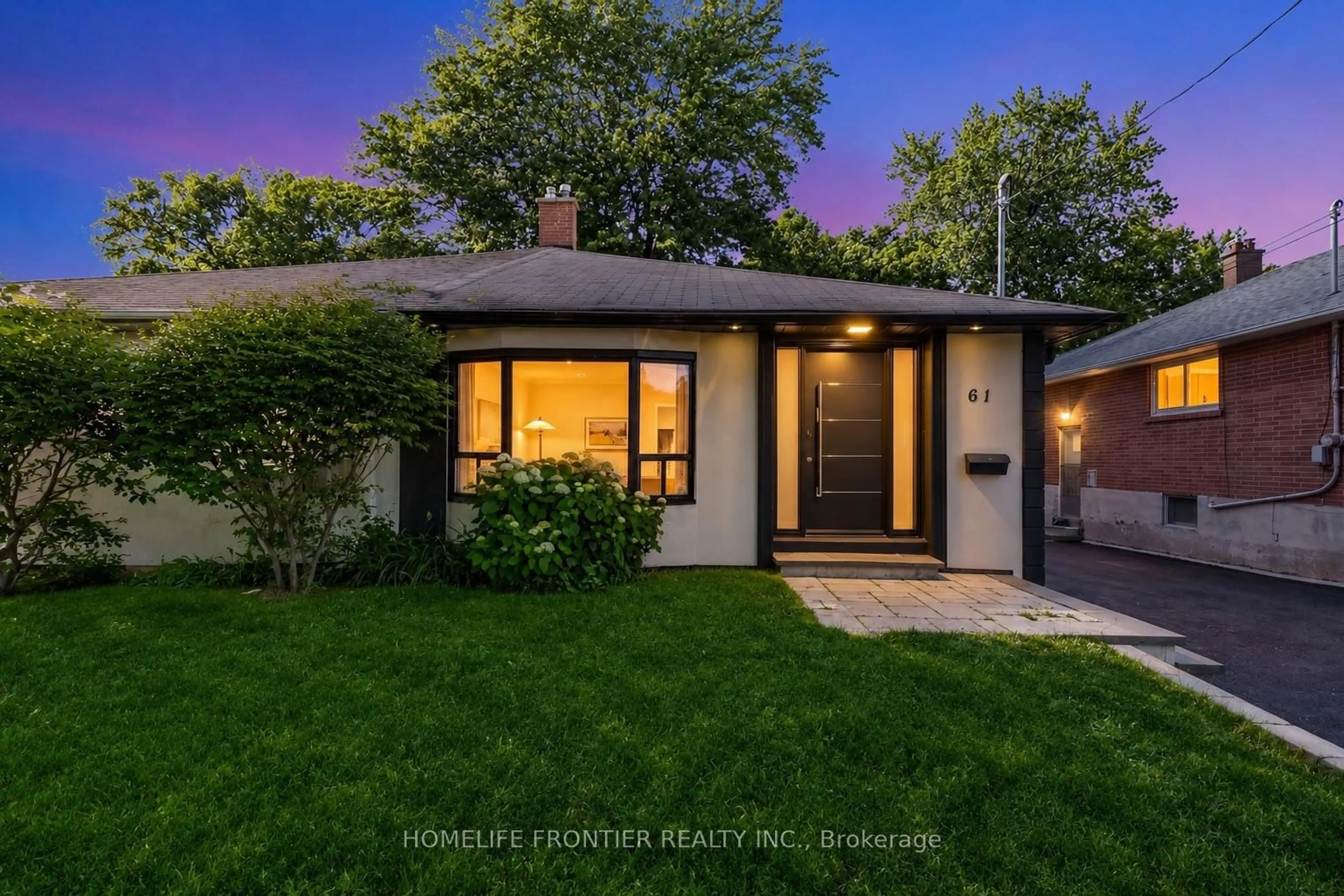 Home with brick exterior material, street for 61 Sundial Cres, Toronto Ontario M4A 2J7
