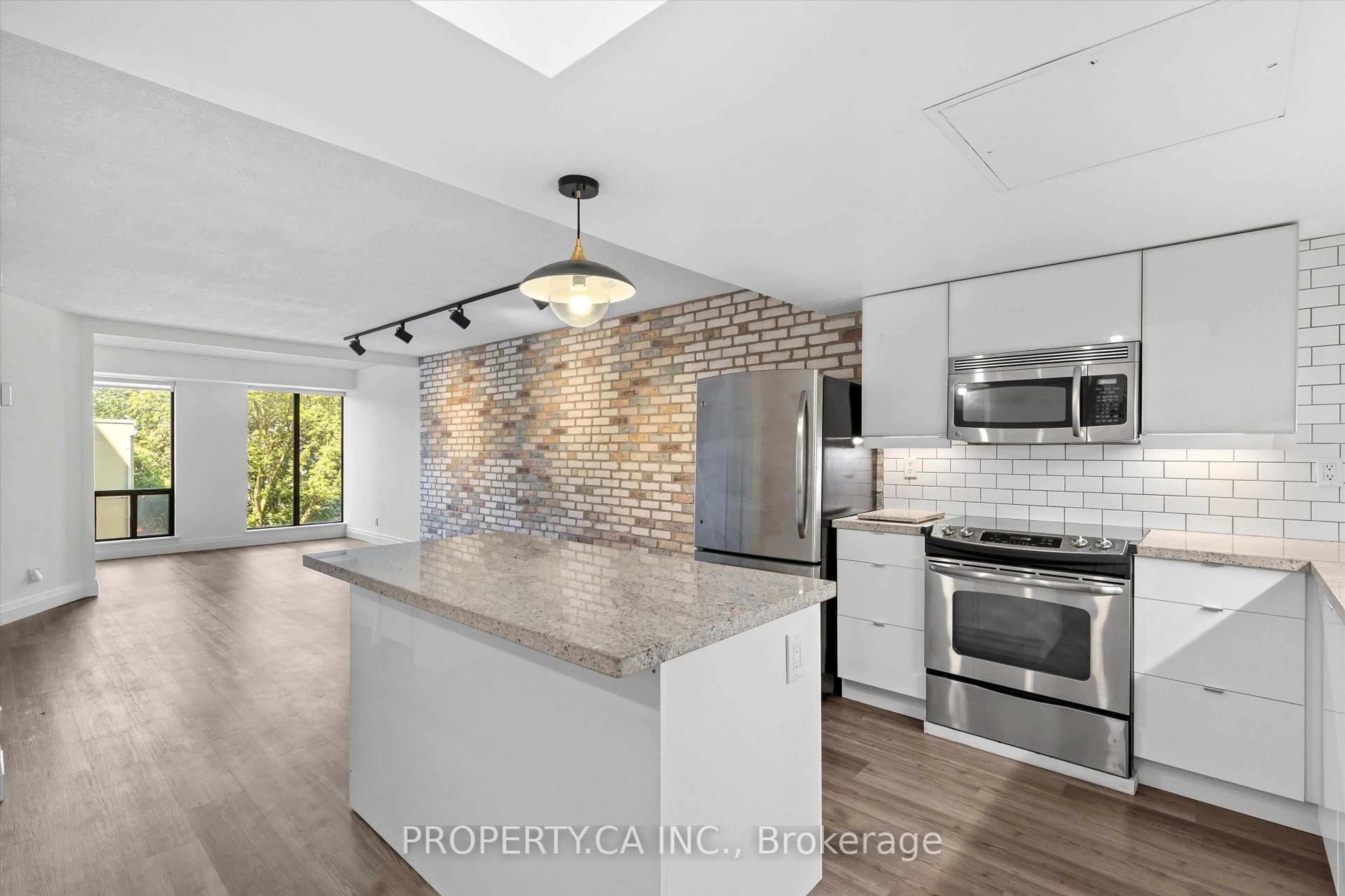 Open concept kitchen, ceramic/tile floor for 456 College St #306, Toronto Ontario M6G 4A3