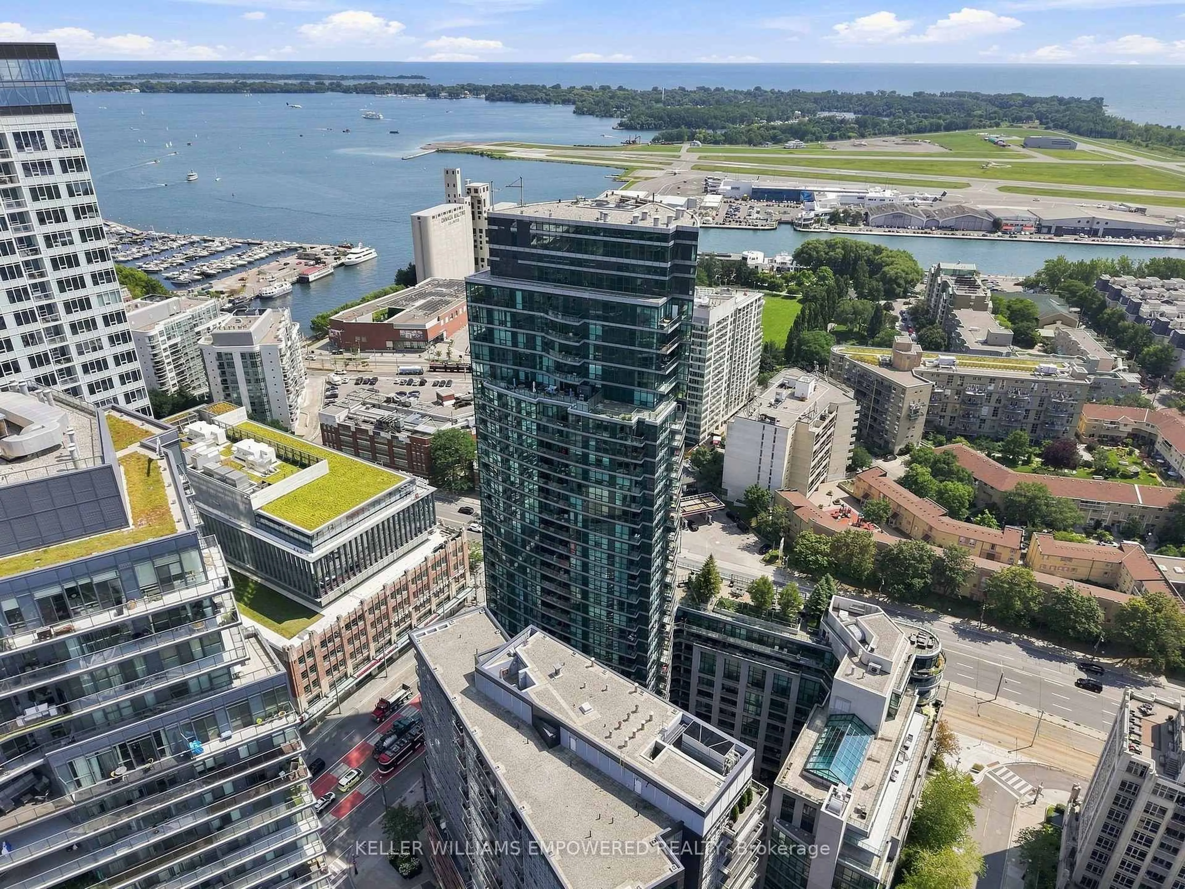A pic from outside/outdoor area/front of a property/back of a property/a pic from drone, city buildings view from balcony for 600 Fleet St #1002, Toronto Ontario M5V 1B7