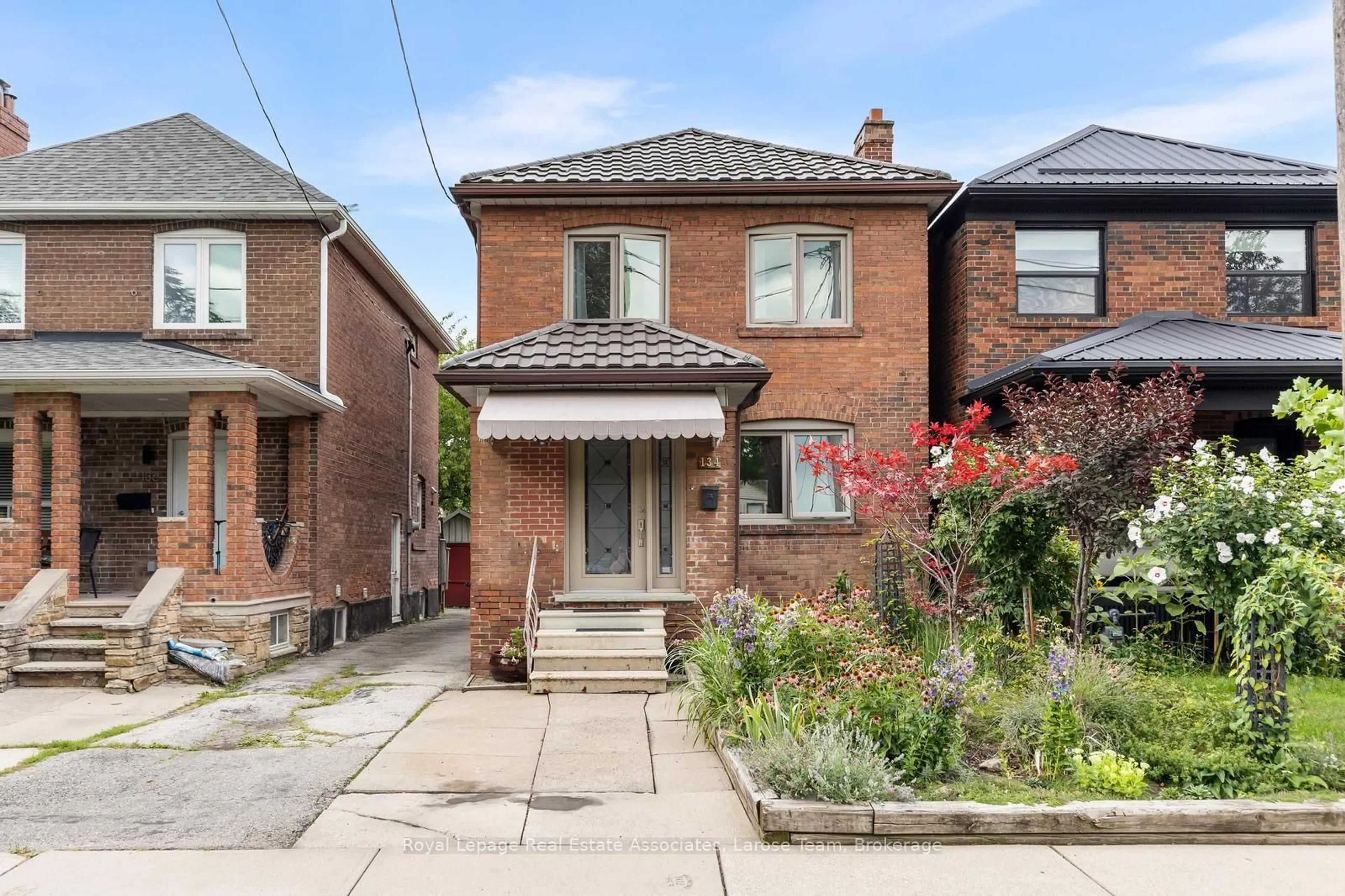 Home with brick exterior material, street for 134 Holland Park Ave, Toronto Ontario M6E 1L6