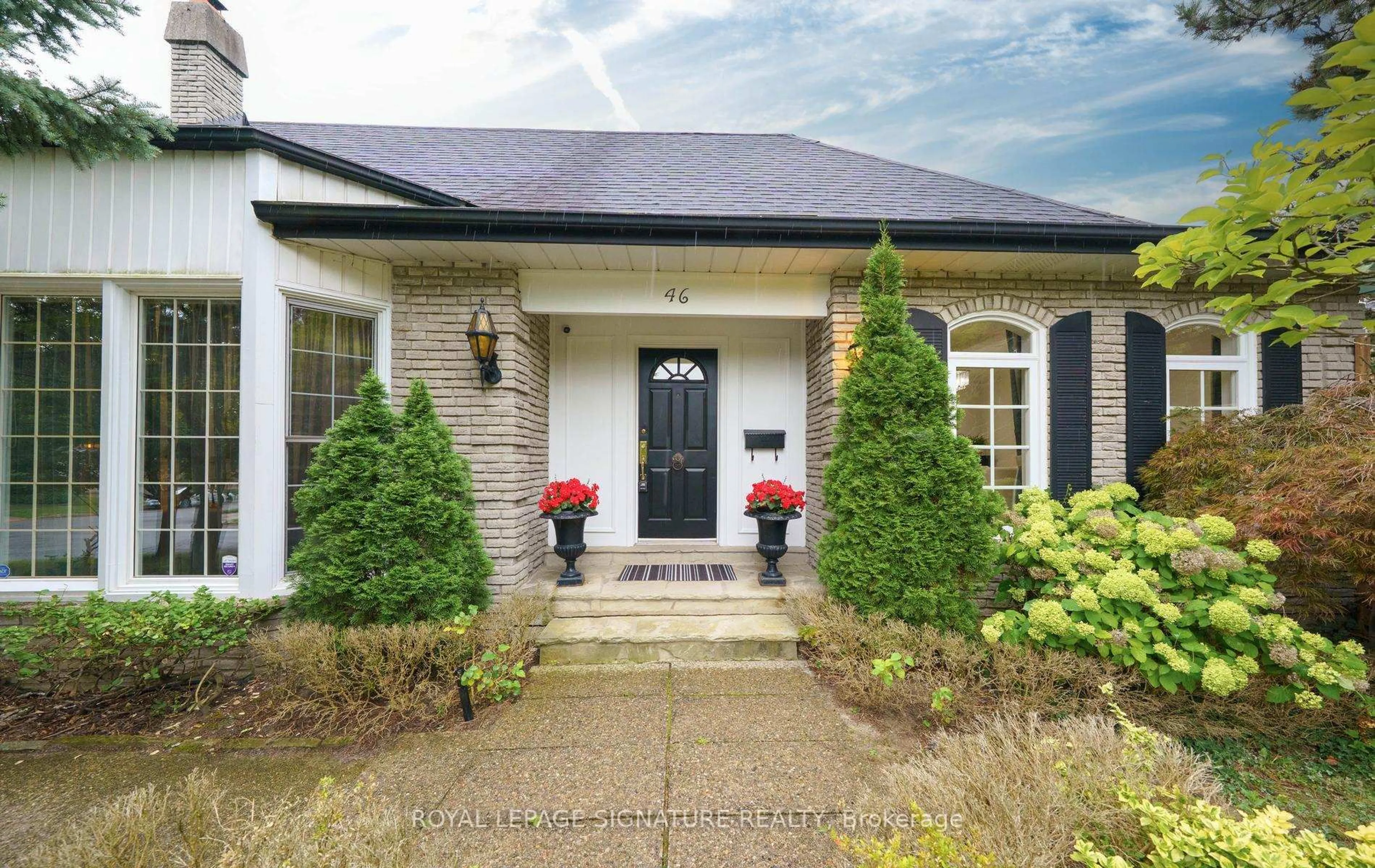 Home with brick exterior material, street for 46 Caravan Dr, Toronto Ontario M3B 1N3