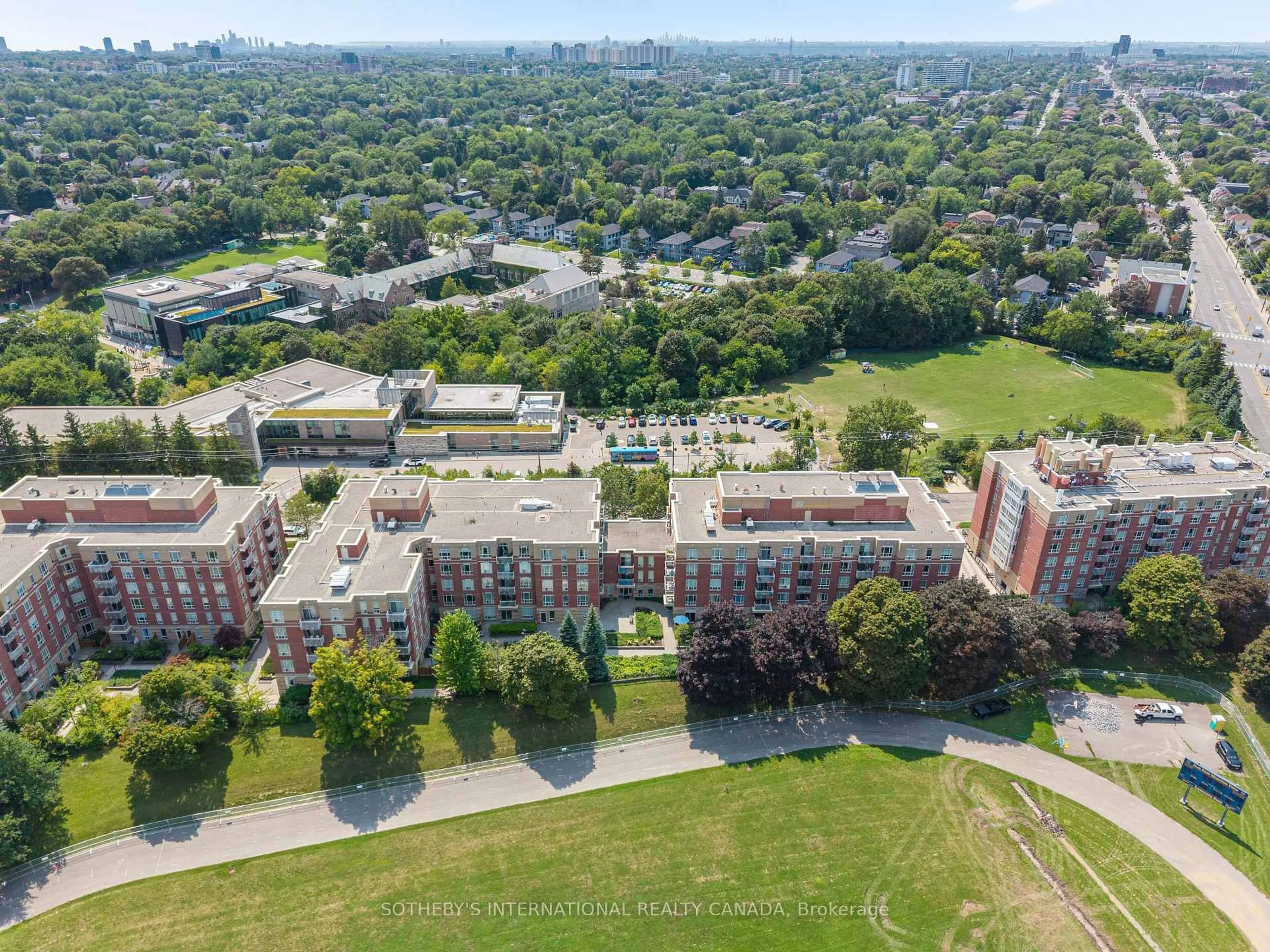 A pic from outside/outdoor area/front of a property/back of a property/a pic from drone, city buildings view from balcony for 485 Rosewell Ave #405, Toronto Ontario M4R 2J2